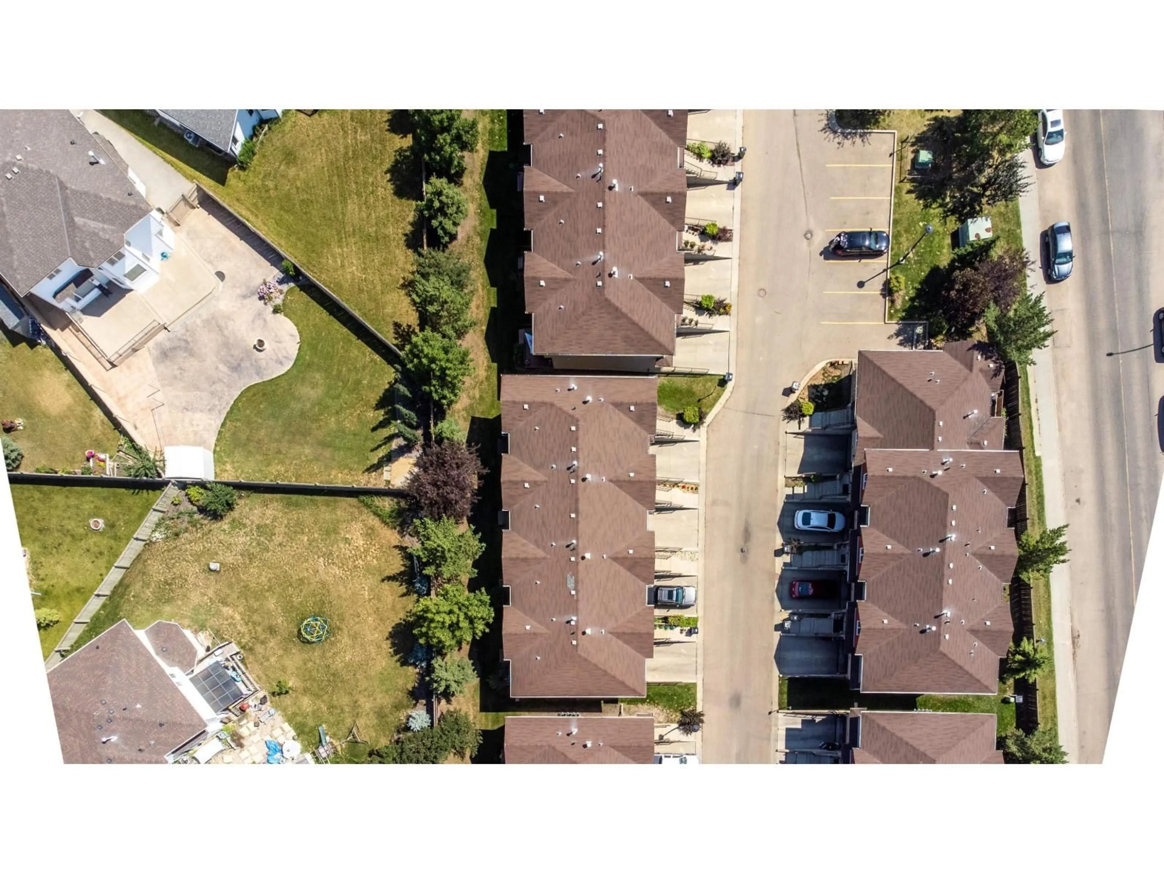 A pic from outside/outdoor area/front of a property/back of a property/a pic from drone, street for #12 - 12930 140 AV, Edmonton Alberta T6V0C4