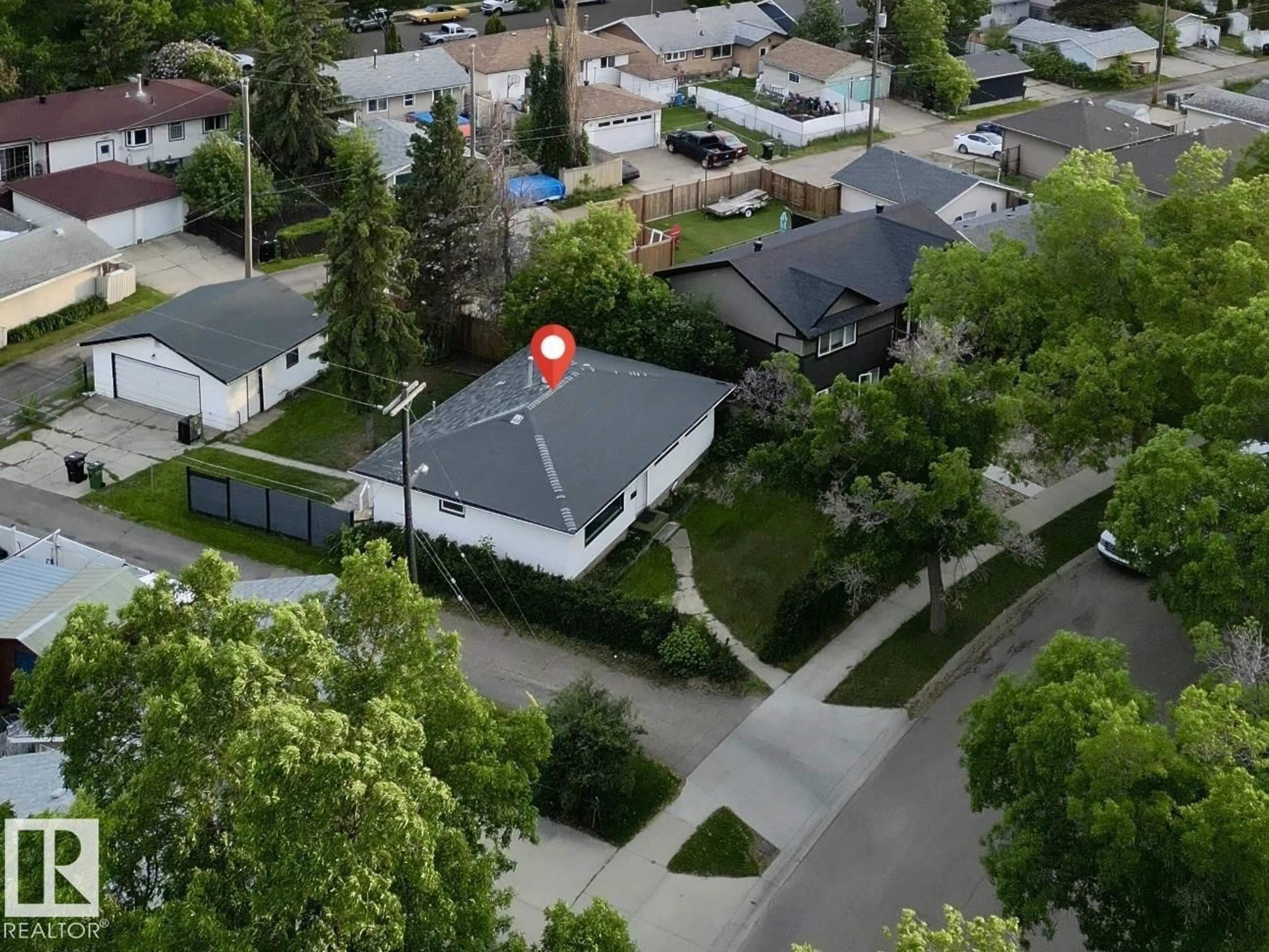 A pic from outside/outdoor area/front of a property/back of a property/a pic from drone, street for 16415 106 AV, Edmonton Alberta T5P0X1