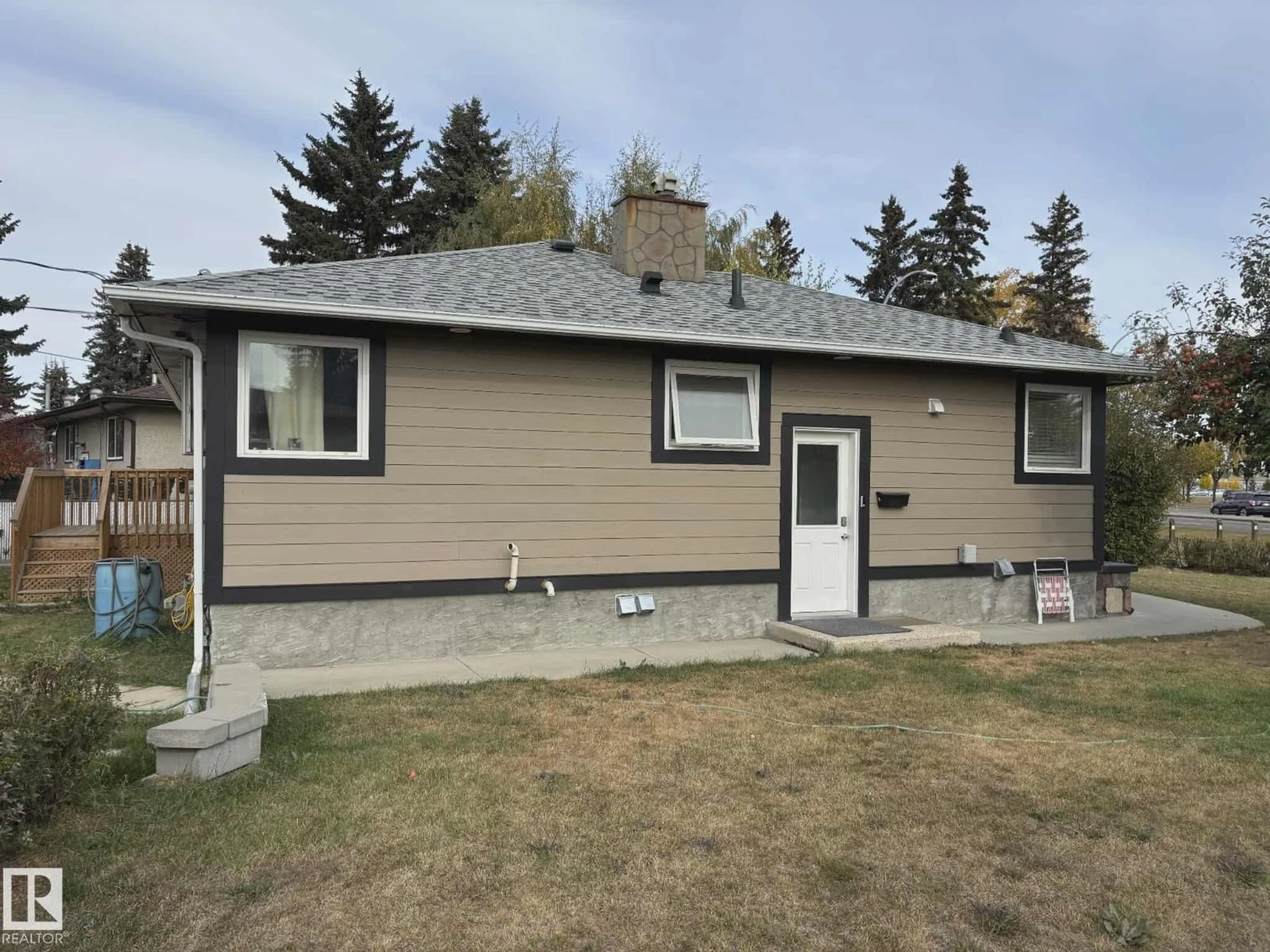 Home with vinyl exterior material, street for NW - 13538 127 ST, Edmonton Alberta T5L1B9