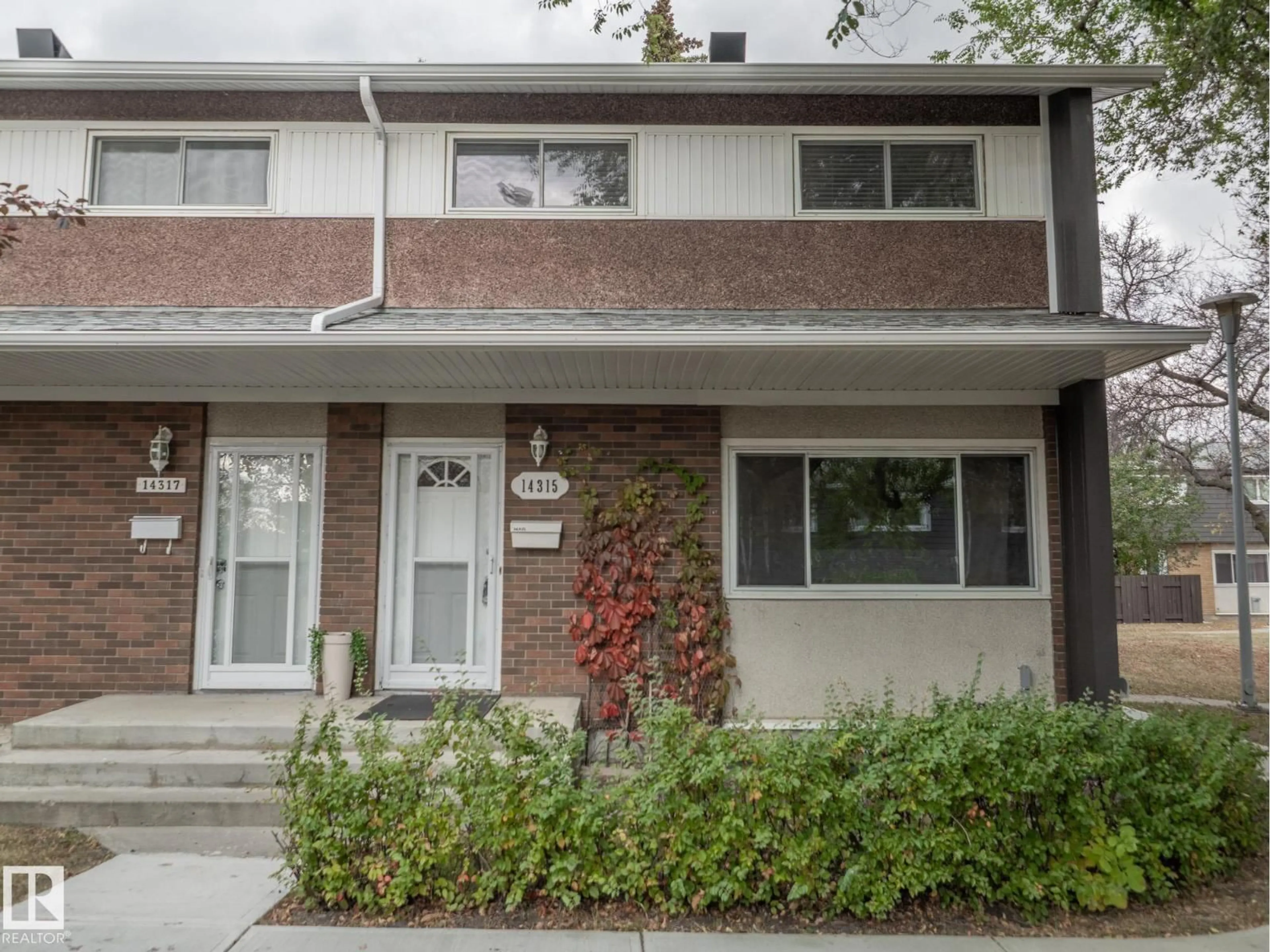 Home with brick exterior material, street for NW - 14315 58 ST, Edmonton Alberta T5A1N6
