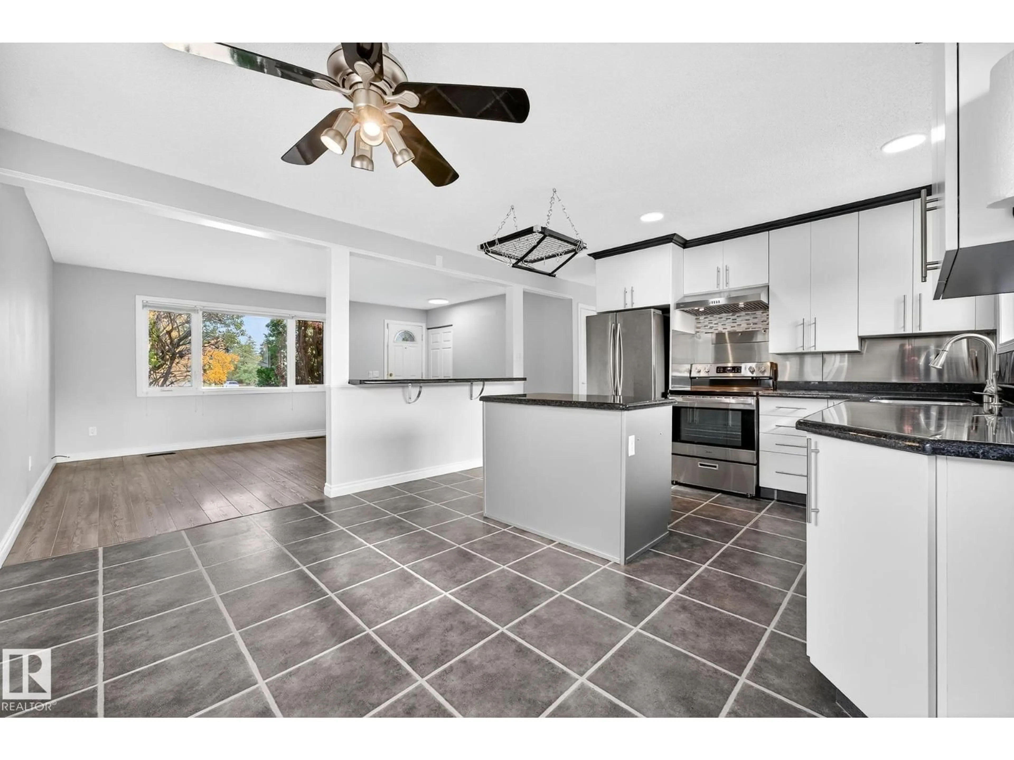 Open concept kitchen, ceramic/tile floor for 11423 35A AV, Edmonton Alberta T6J2G3