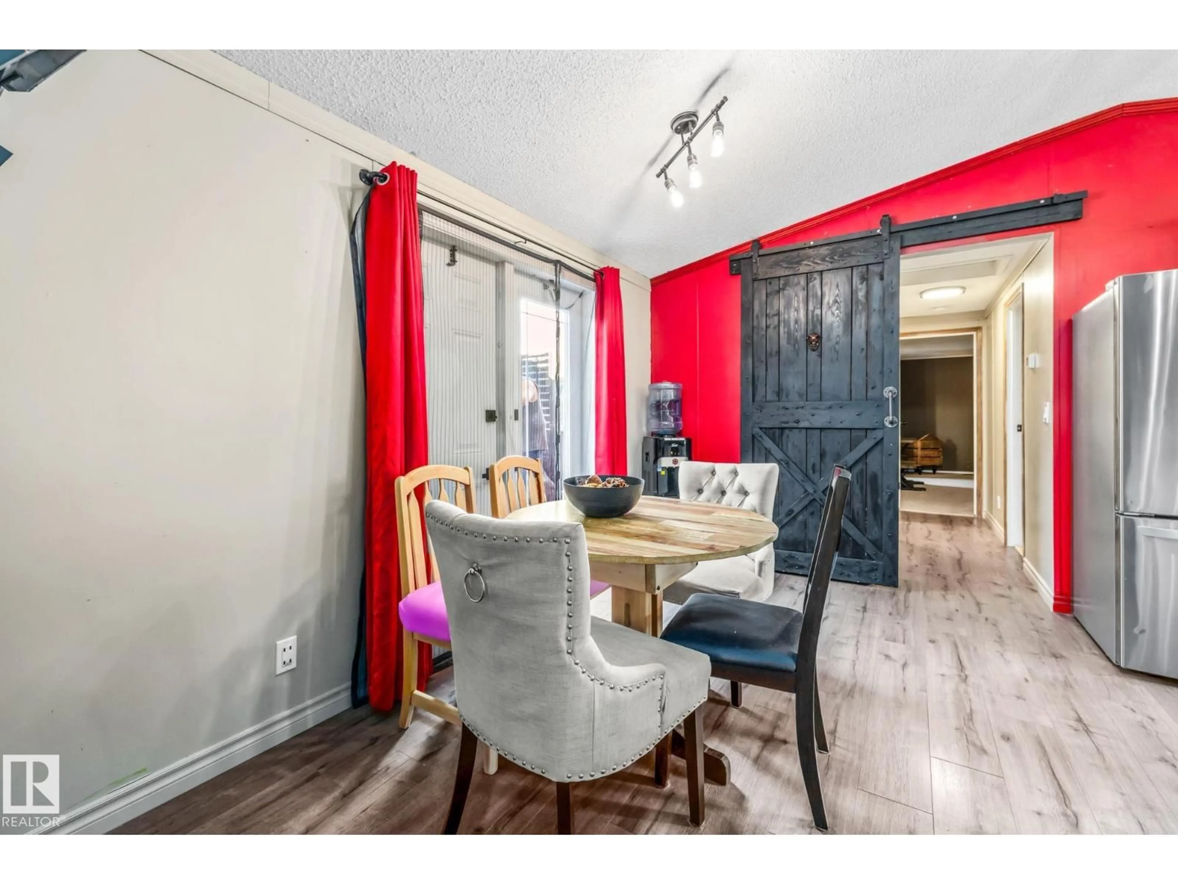 Dining room, wood/laminate floor for E - 1019 ASPEN DR, Leduc Alberta T9E8R5