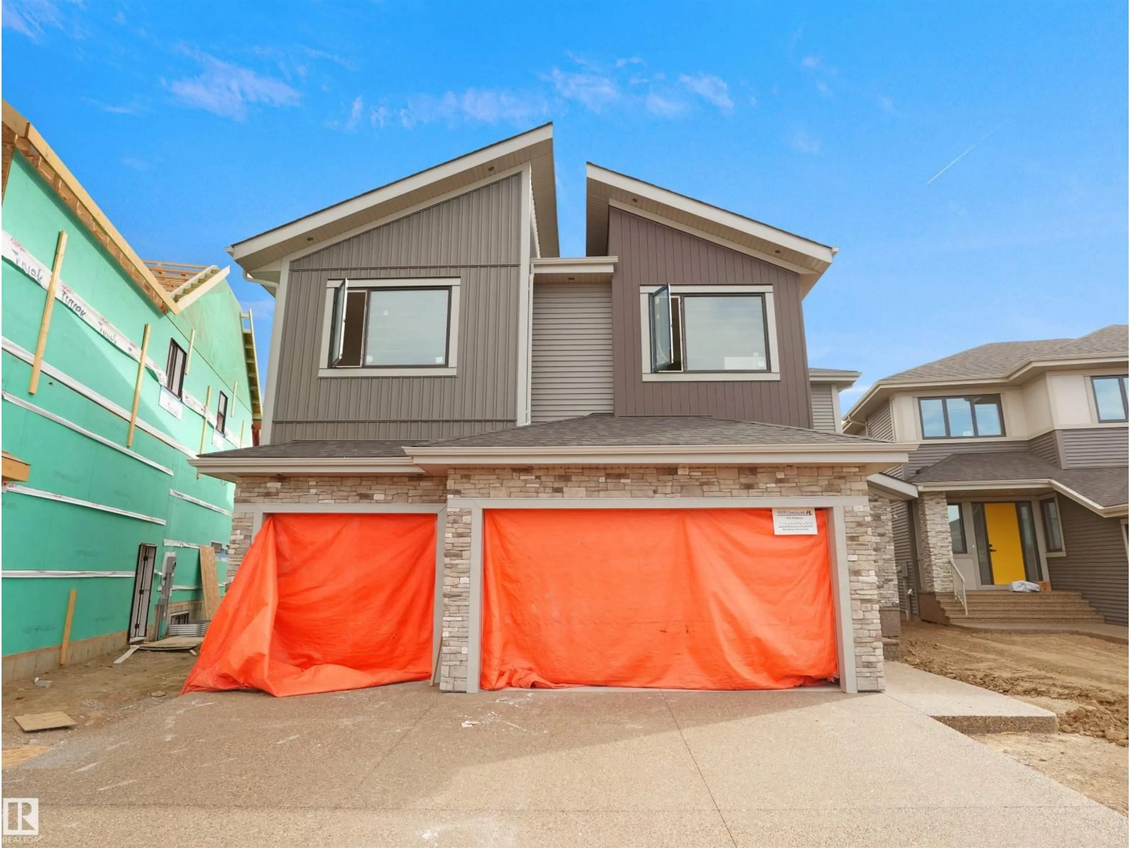 Home with vinyl exterior material, street for 4118 GINSBURG PL, Edmonton Alberta T5T4V1