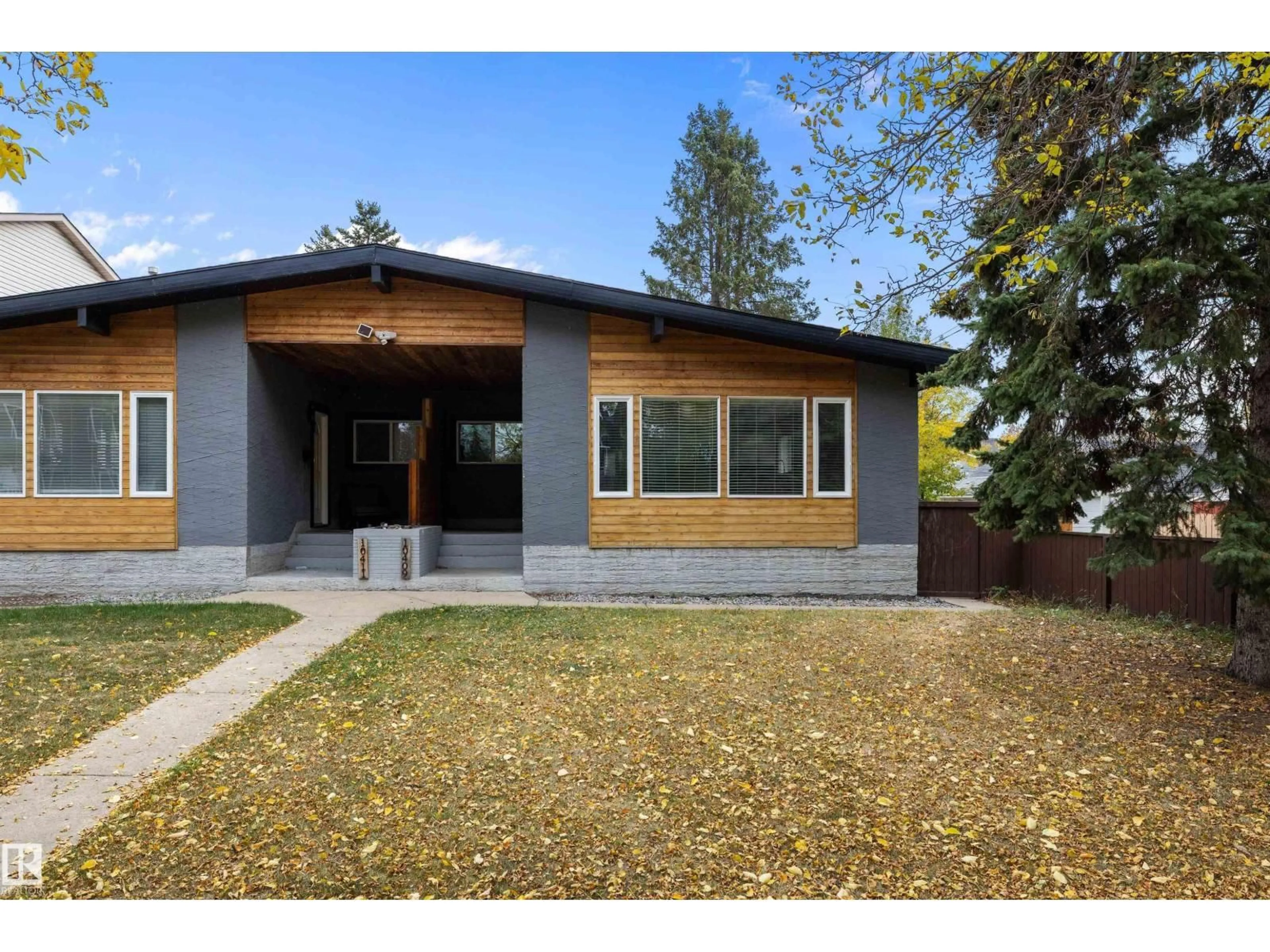 Home with brick exterior material, street for NW - 10409 148 ST, Edmonton Alberta T5N3G7
