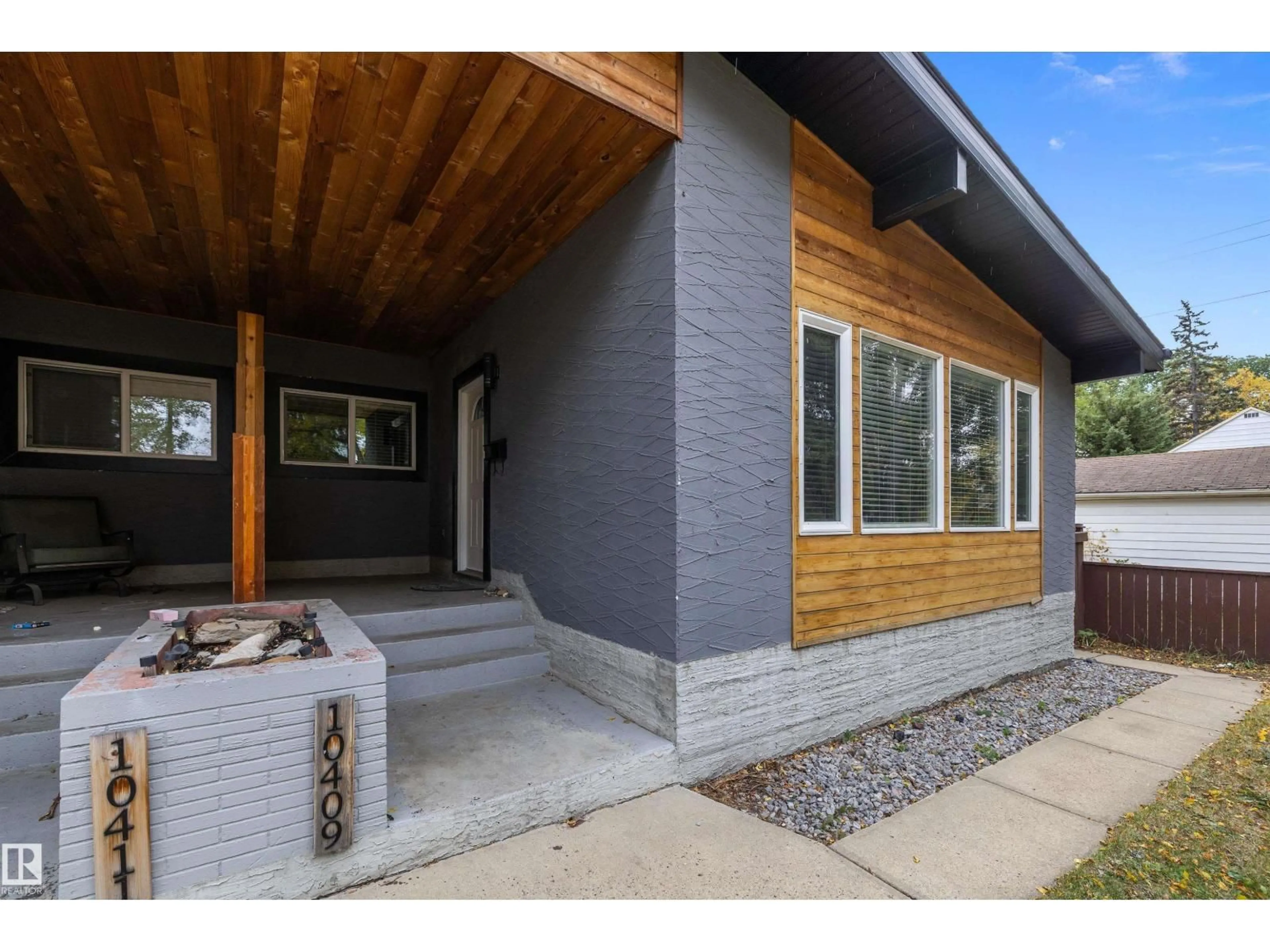 Home with brick exterior material, street for NW - 10409 148 ST, Edmonton Alberta T5N3G7