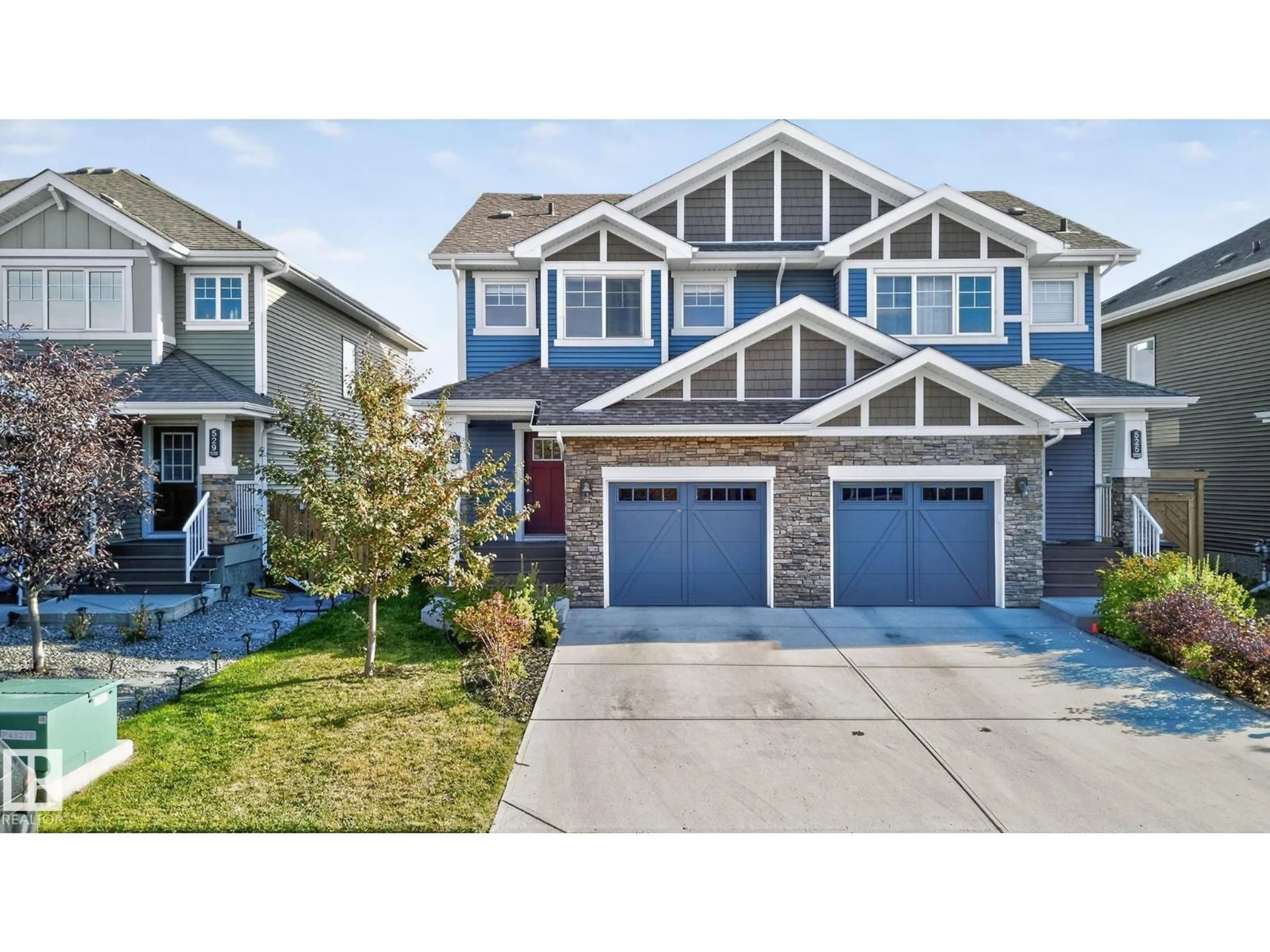 Home with vinyl exterior material, street for 527 EBBERS WY, Edmonton Alberta T5Y3T8