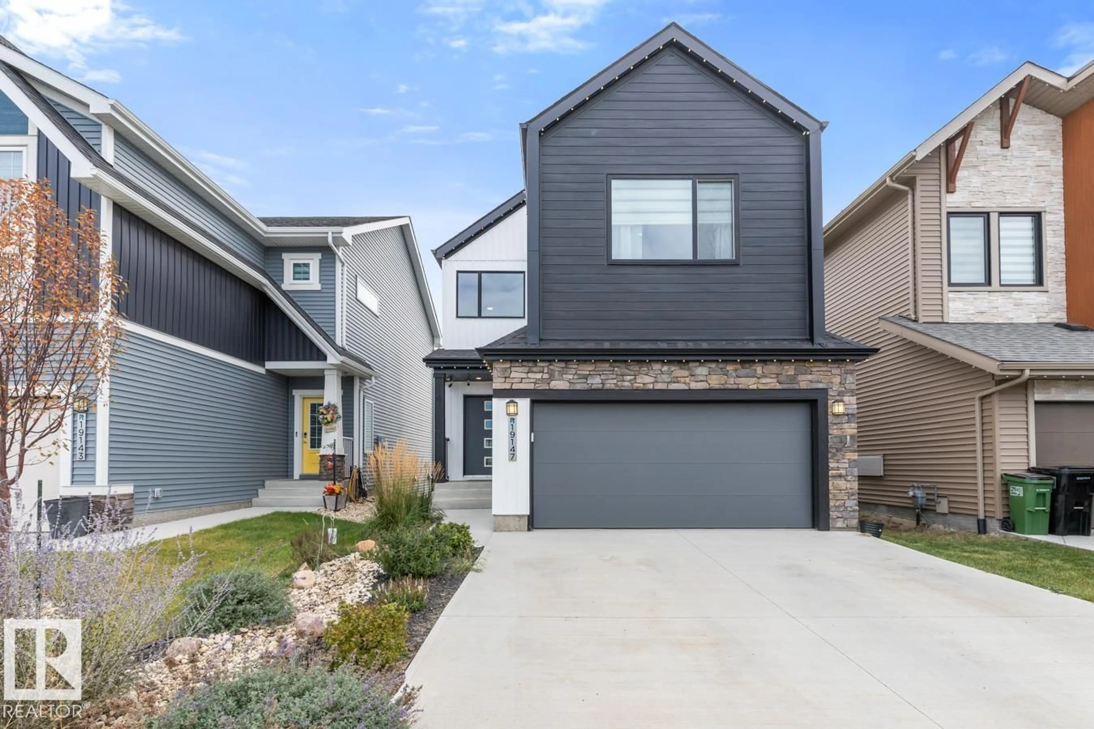 Home with brick exterior material, street for NW - 19147 22 AV, Edmonton Alberta T6M1R1