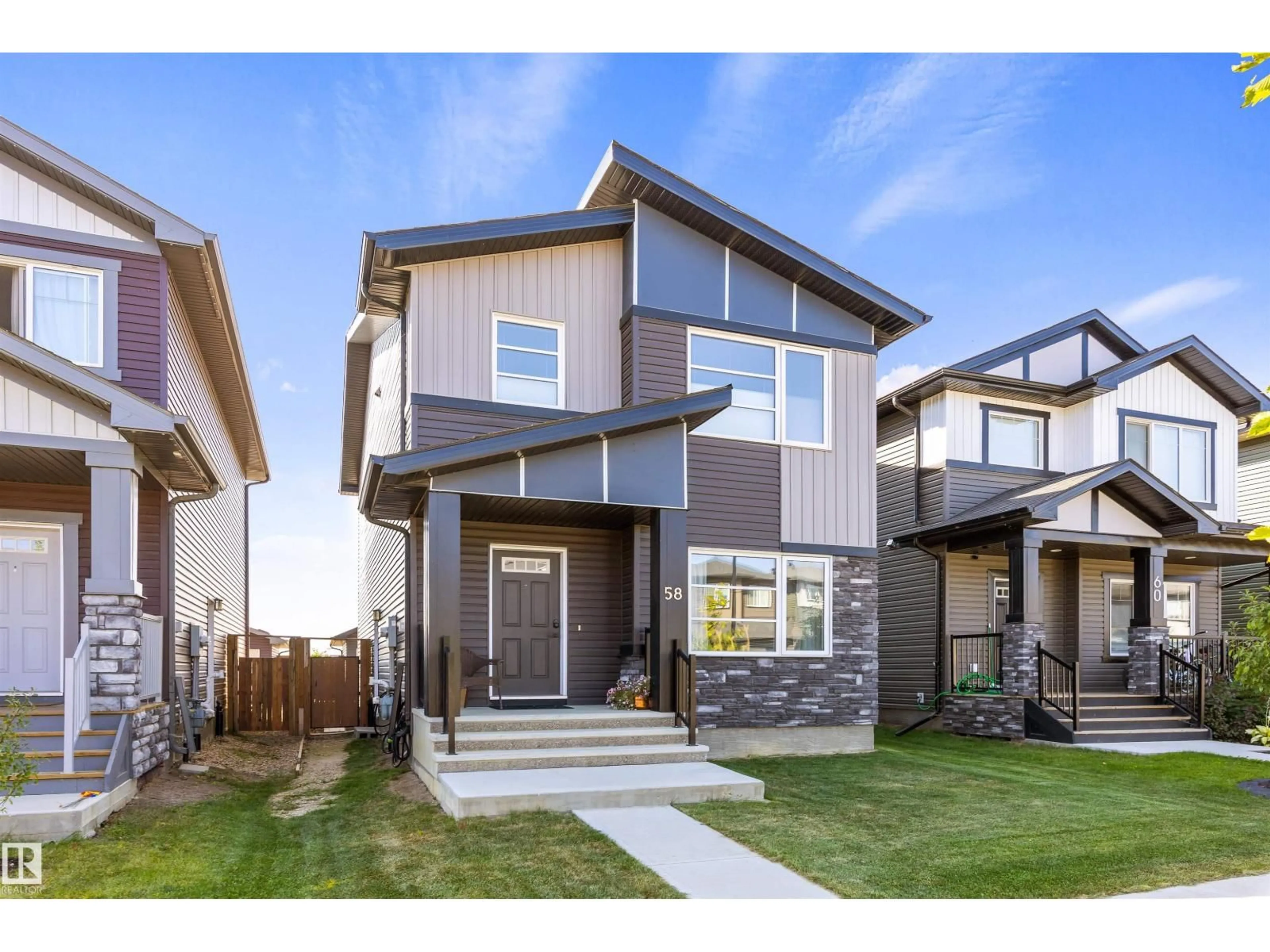 Home with vinyl exterior material, street for 58 REDSPUR DR, St. Albert Alberta T8N7Y6