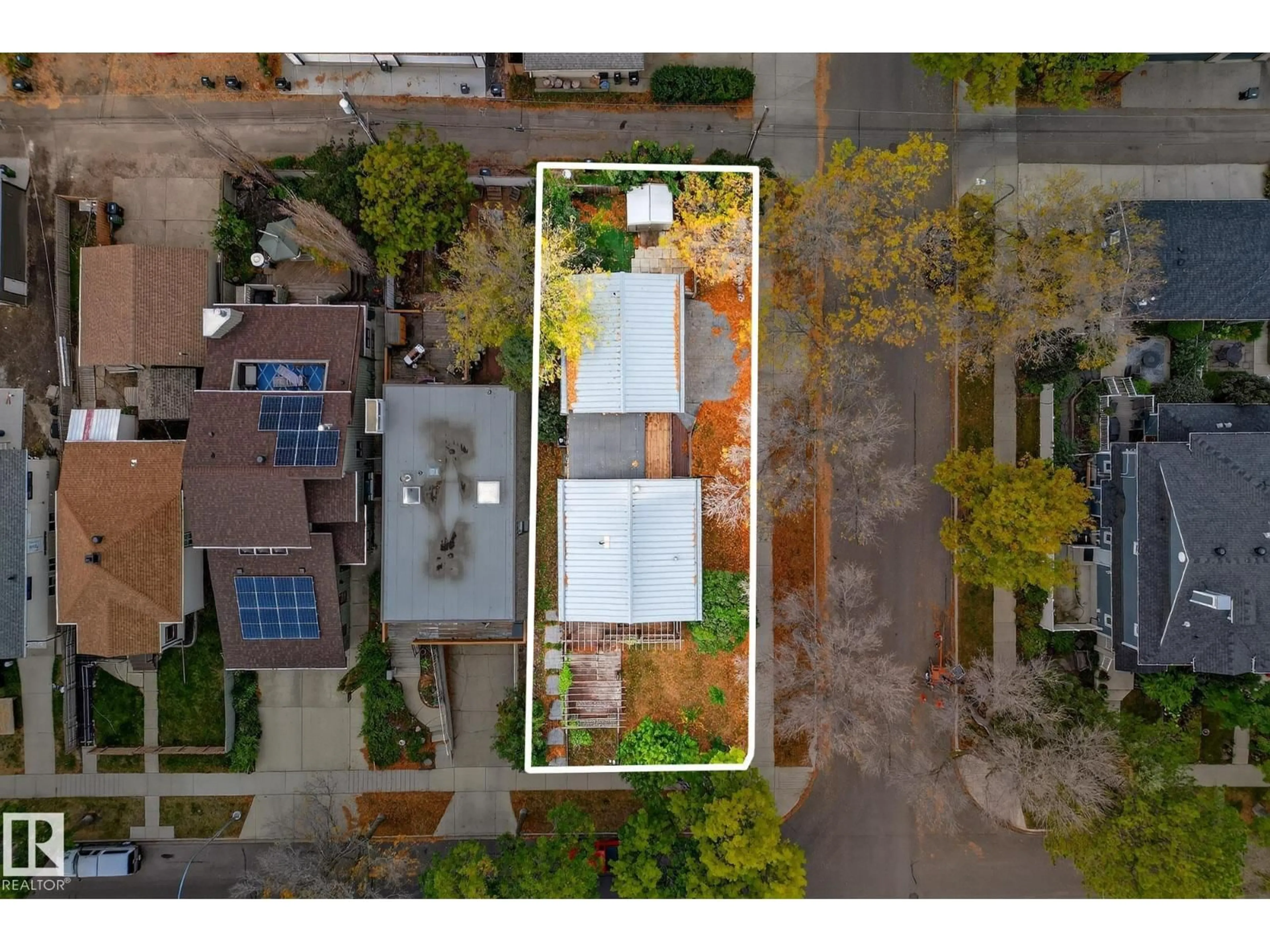 A pic from outside/outdoor area/front of a property/back of a property/a pic from drone, street for 8860 93 ST, Edmonton Alberta T6C3T1