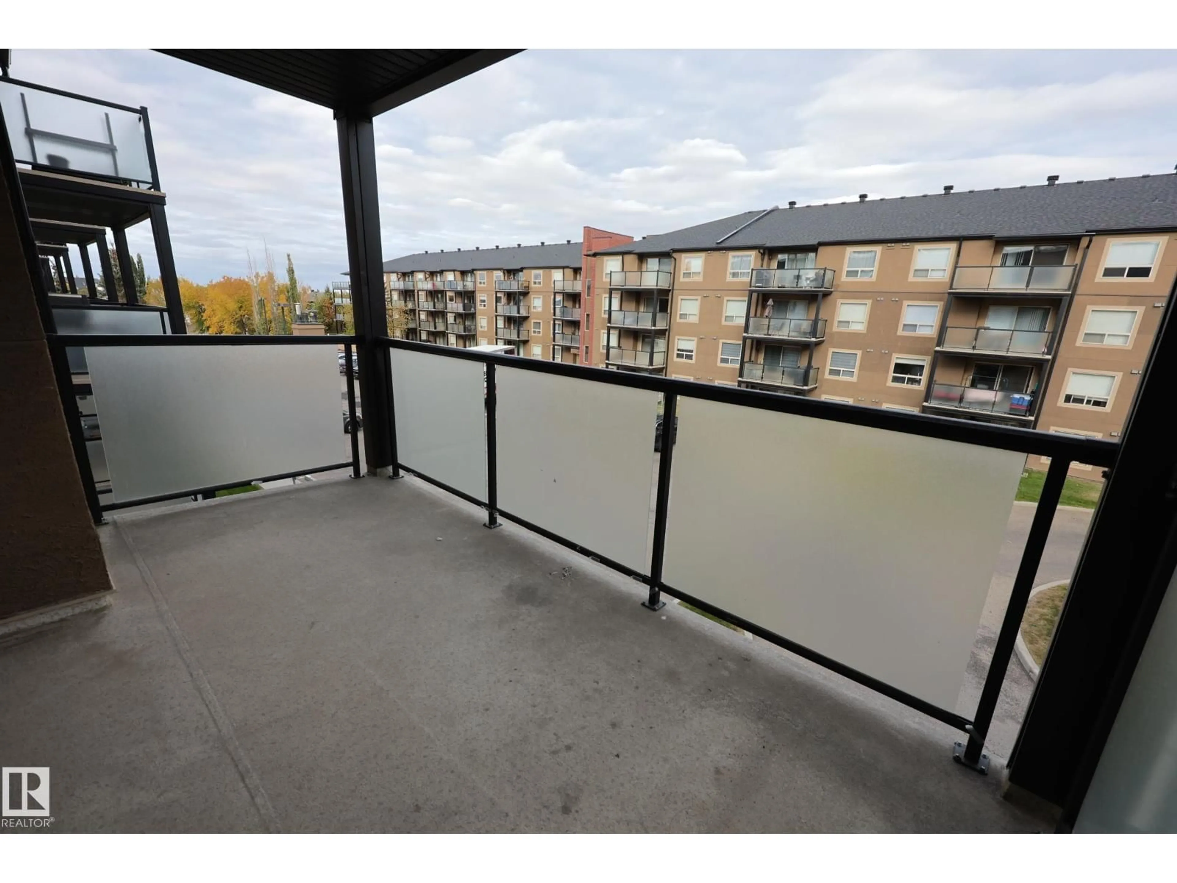 Balcony in the apartment, city buildings view from balcony for #306 - 13908 136 ST, Edmonton Alberta T6V1Y4