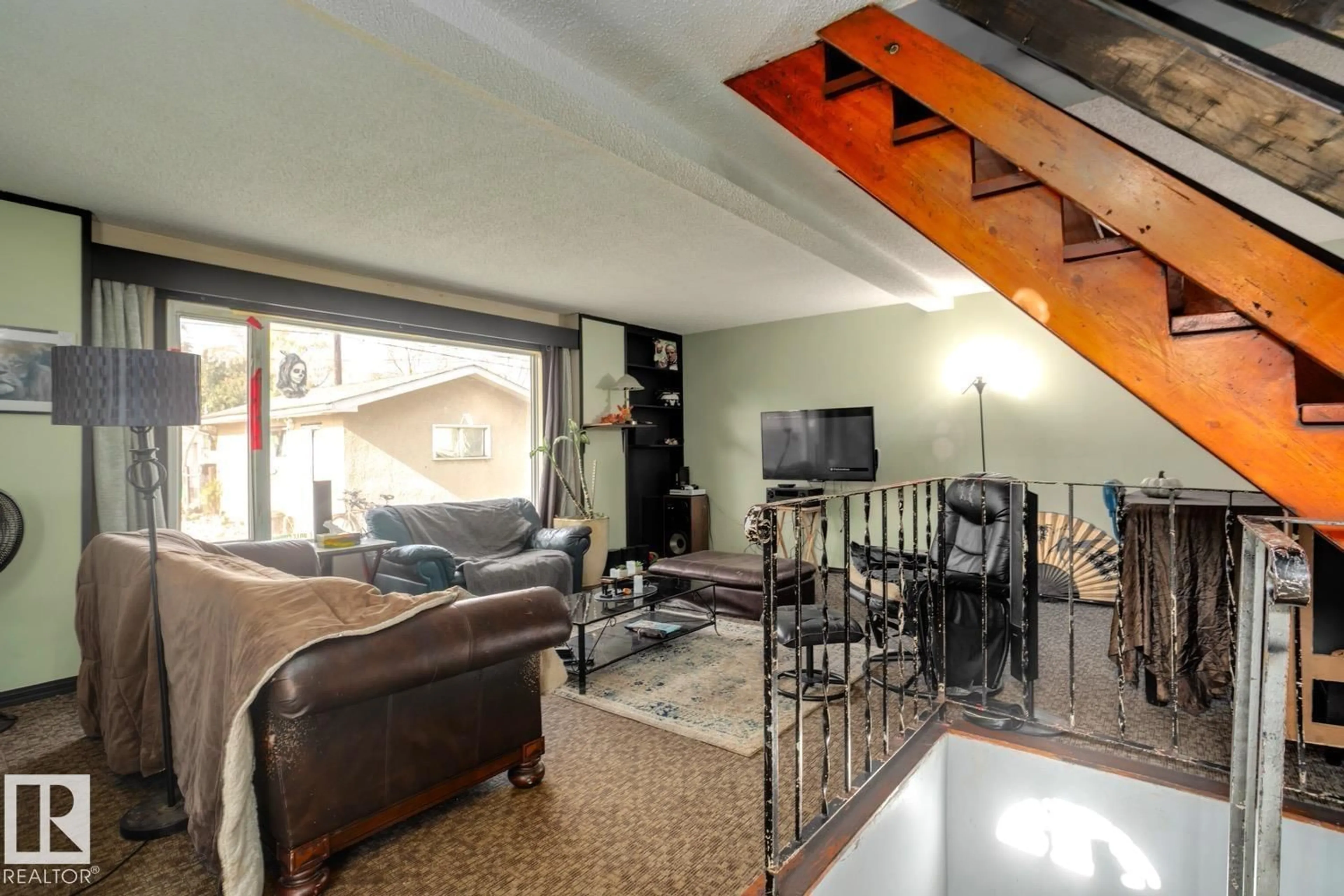 Living room with furniture, unknown for 12116 48 ST, Edmonton Alberta T5W2Z2