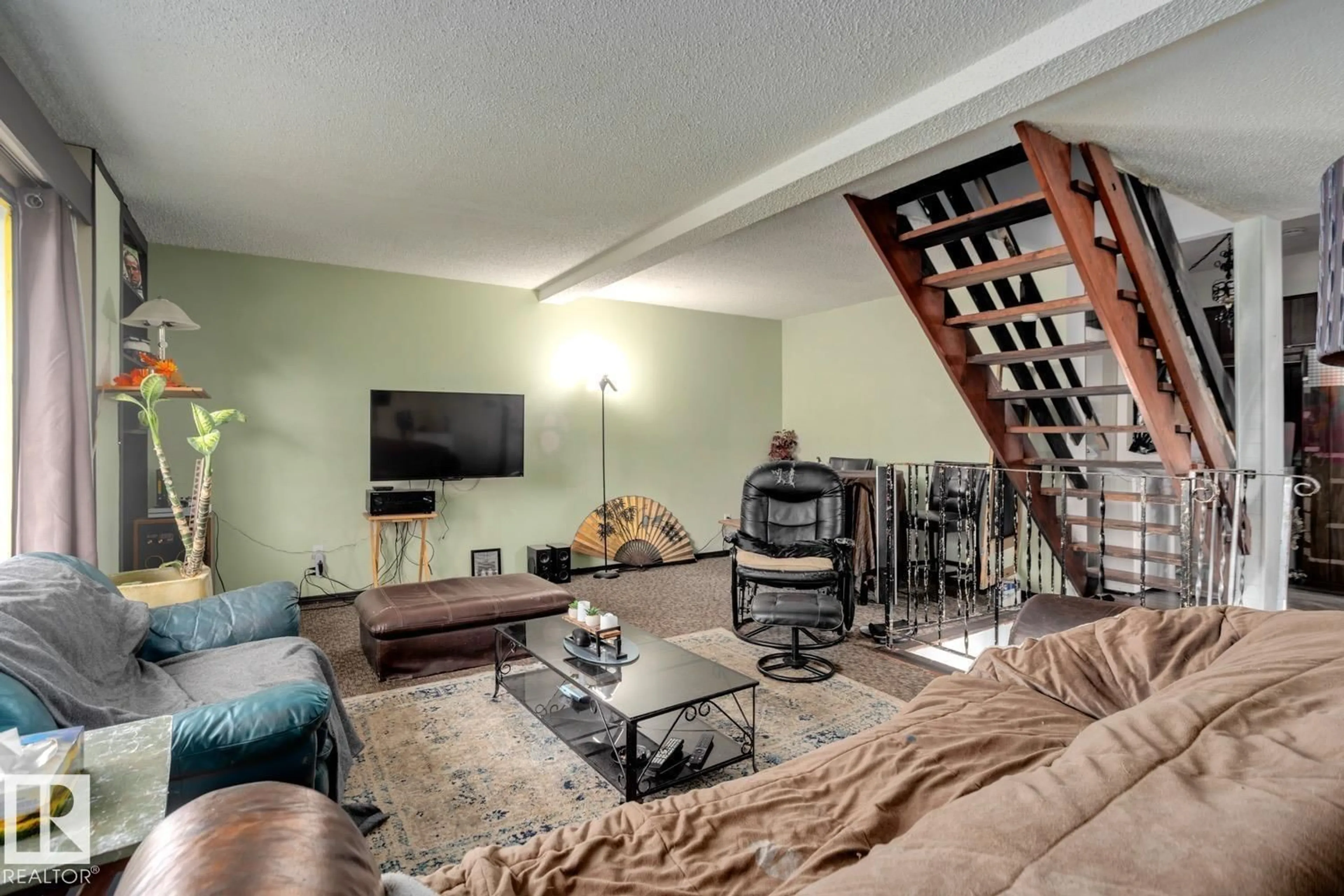 Living room with furniture, unknown for 12116 48 ST, Edmonton Alberta T5W2Z2