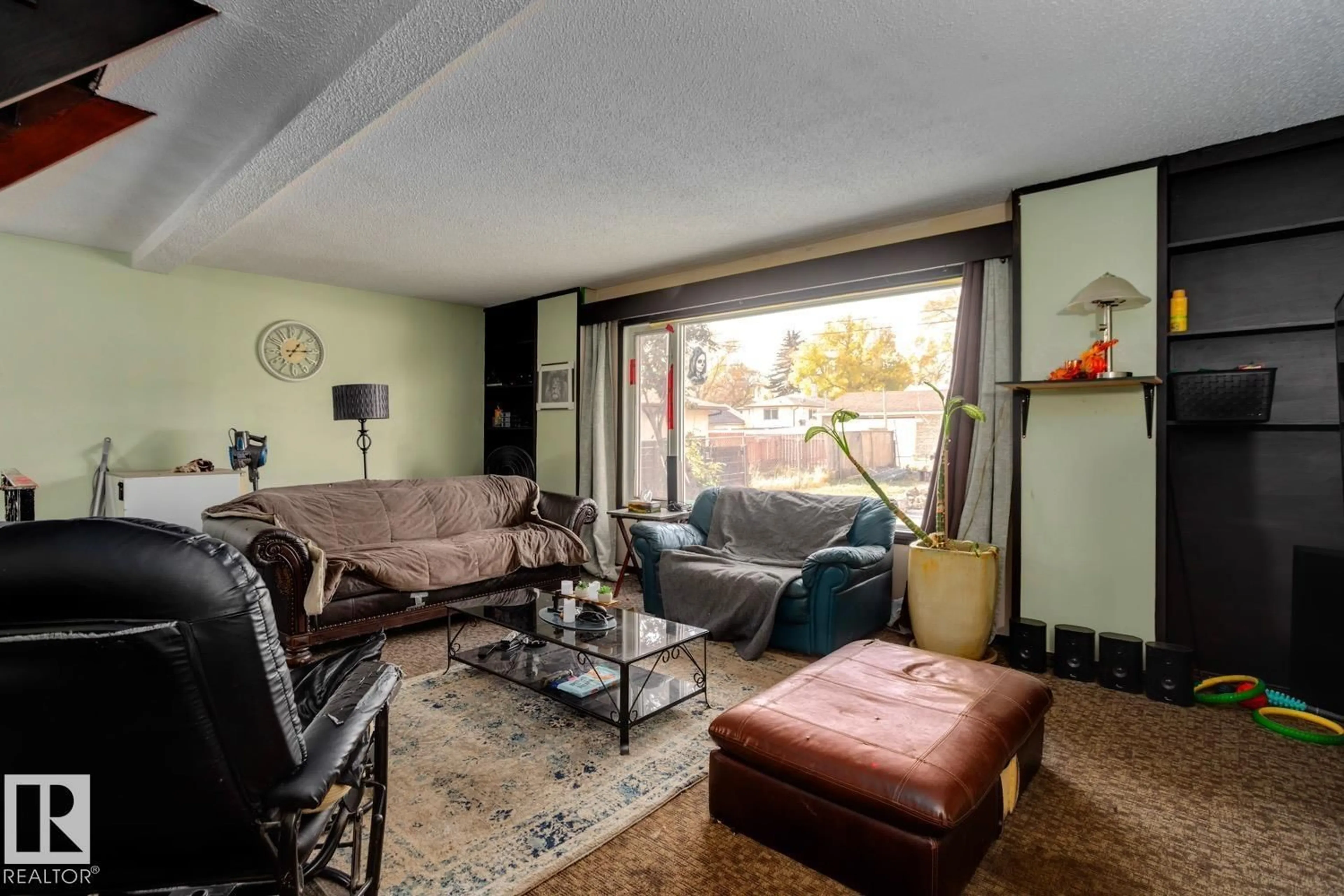 Living room with furniture, unknown for 12116 48 ST, Edmonton Alberta T5W2Z2
