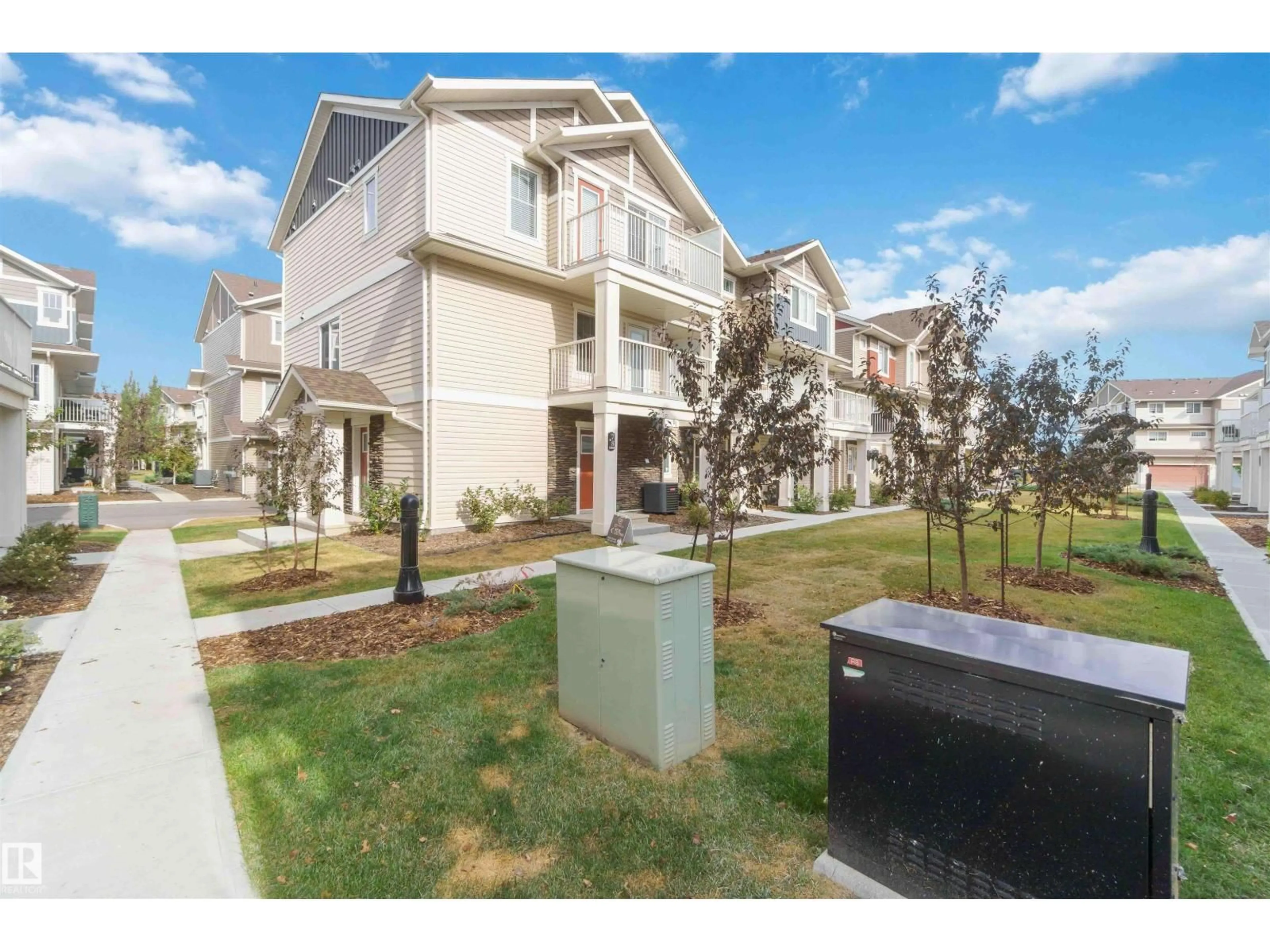 A pic from outside/outdoor area/front of a property/back of a property/a pic from drone, street for NW - 77 17832 78 ST, Edmonton Alberta T5Z0P7