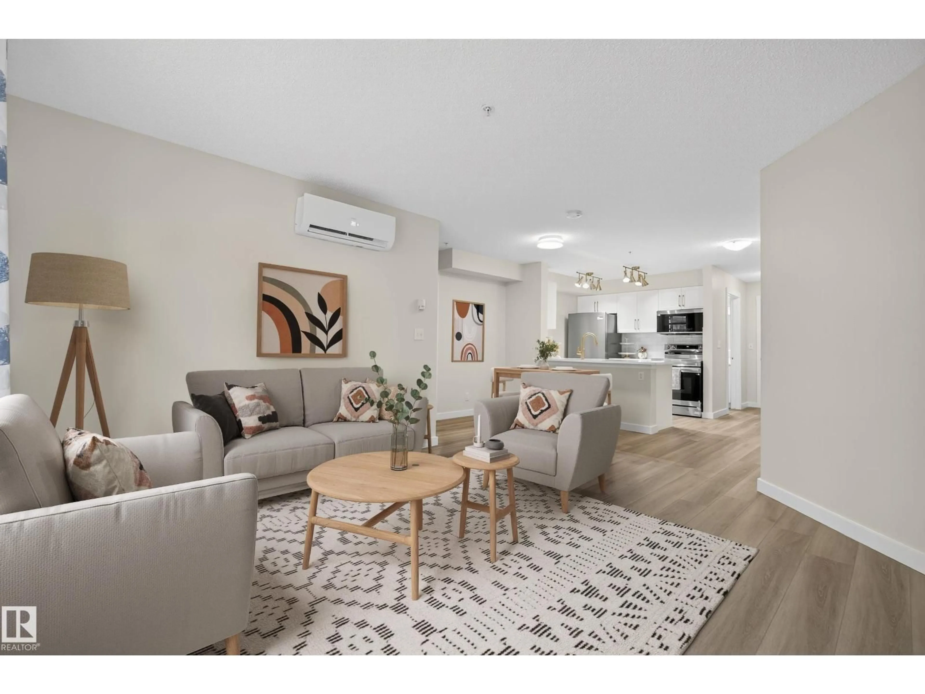 Living room with furniture, unknown for 109 - 5804 MULLEN PL, Edmonton Alberta T6R0W3