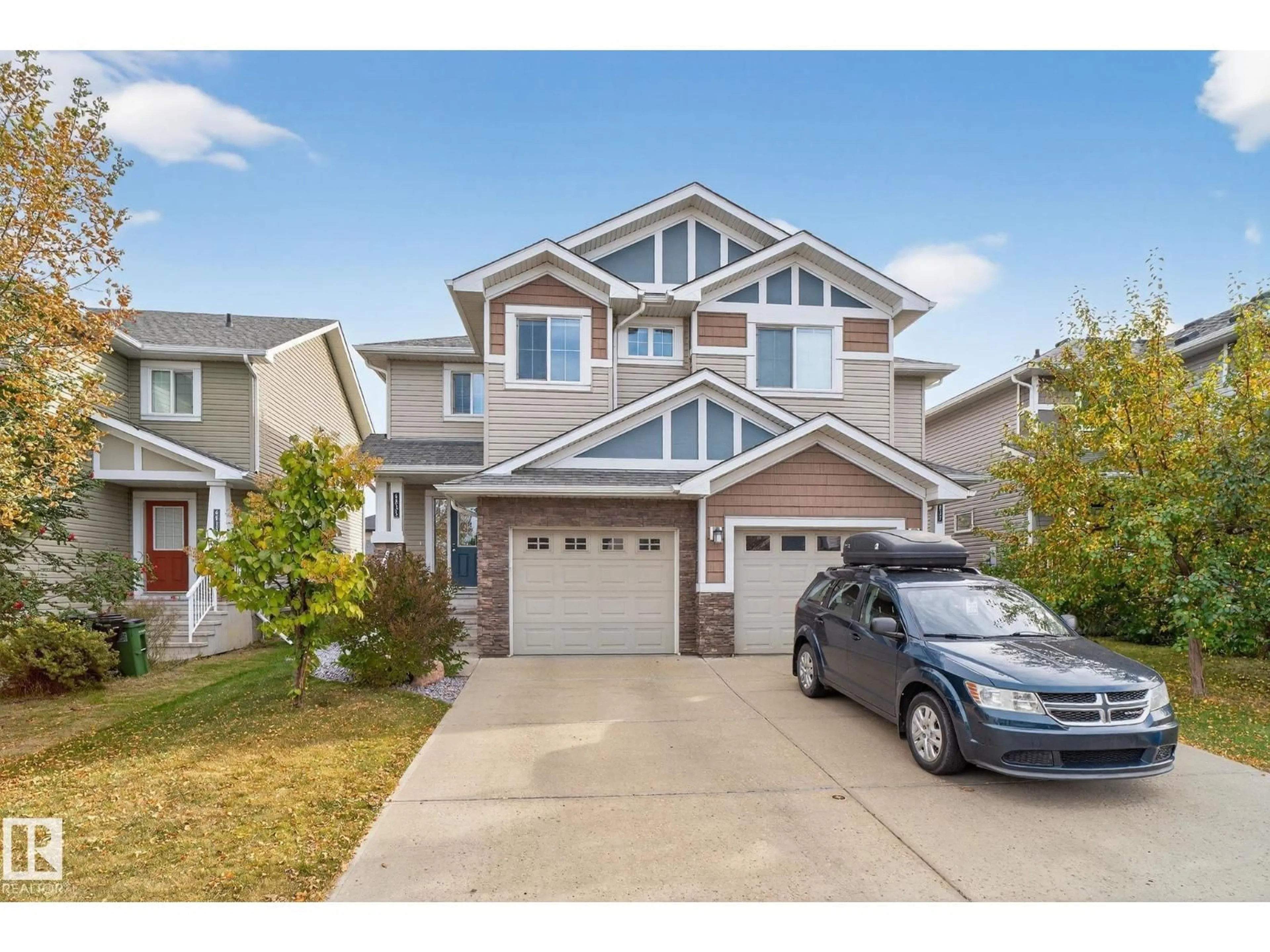 Home with vinyl exterior material, street for SW SW - 6835 CARDINAL LI, Edmonton Alberta T6W1Z1