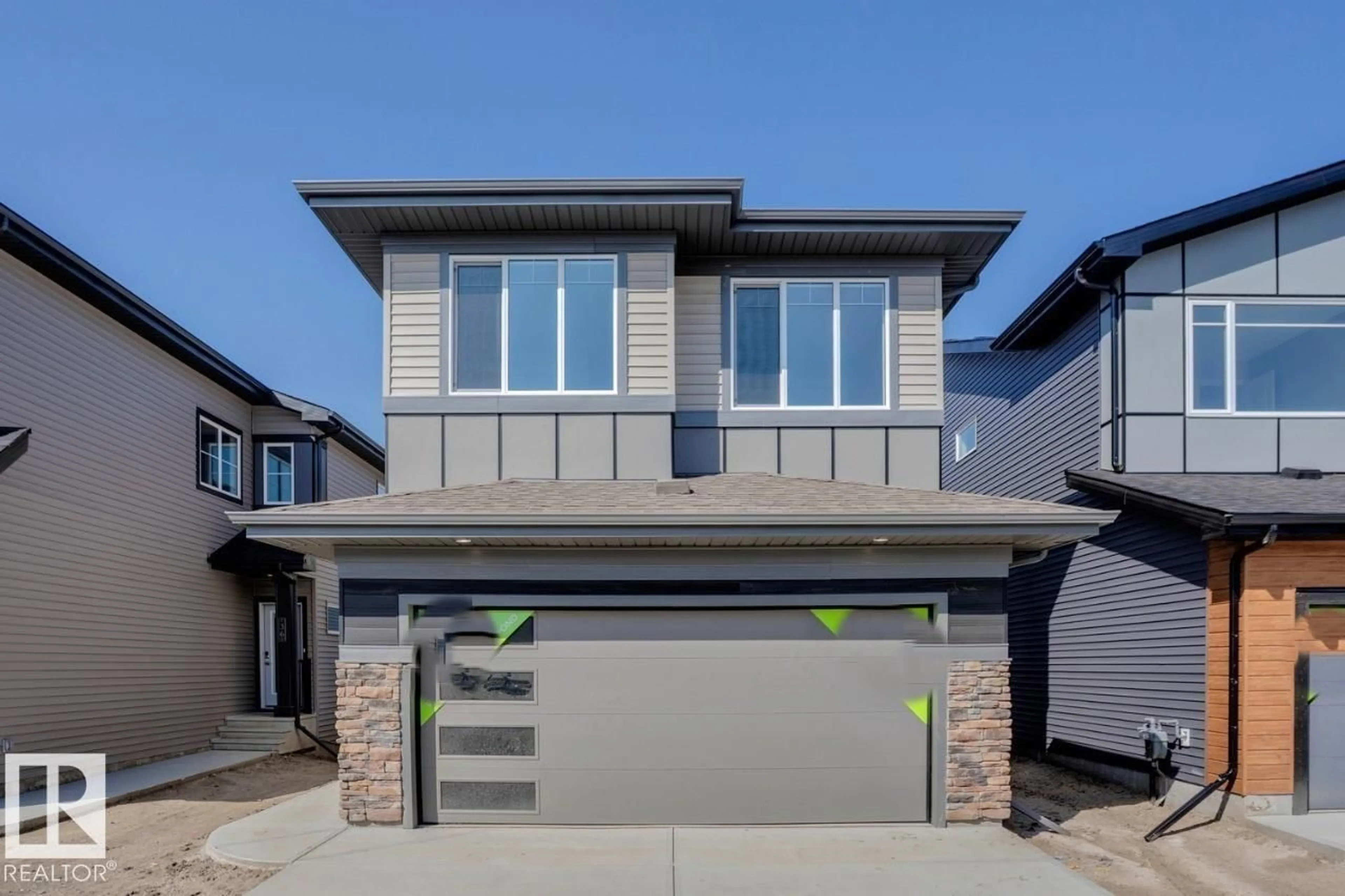 Home with vinyl exterior material, street for 38 GAMBEL LO, Spruce Grove Alberta T7X0C9