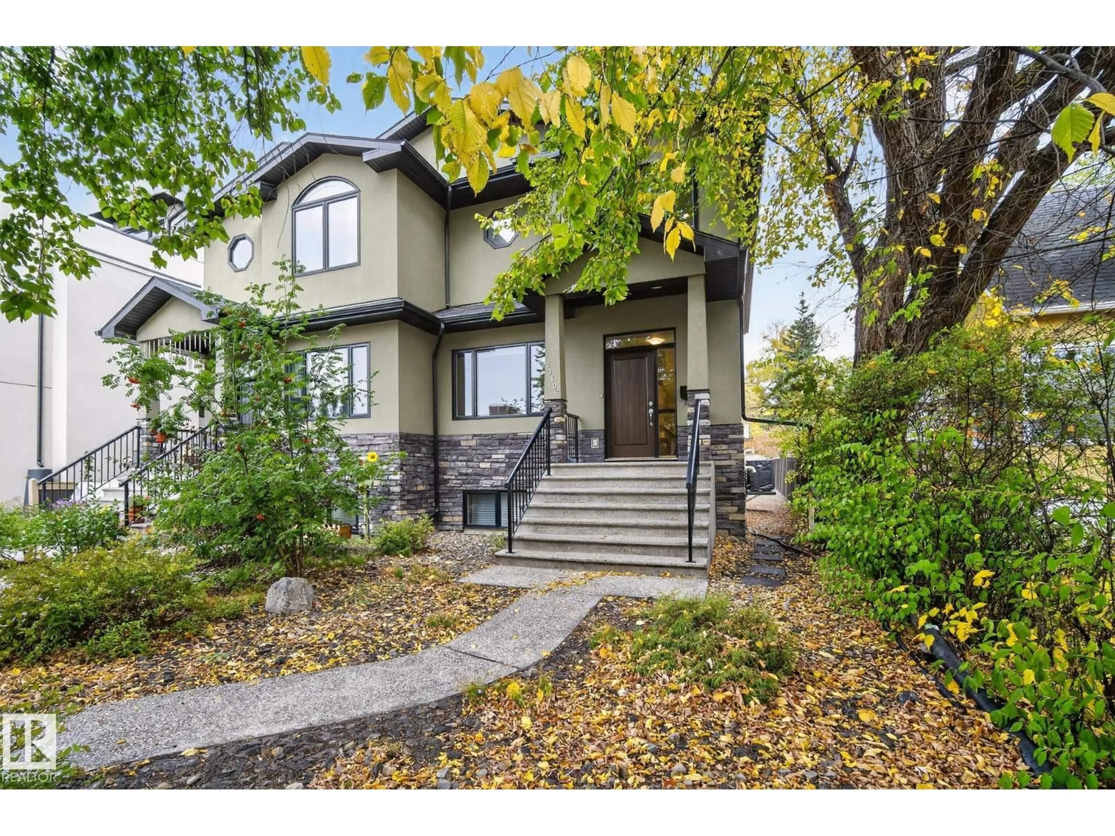 Home with vinyl exterior material, street for 11106 76 AV, Edmonton Alberta T6G0J8
