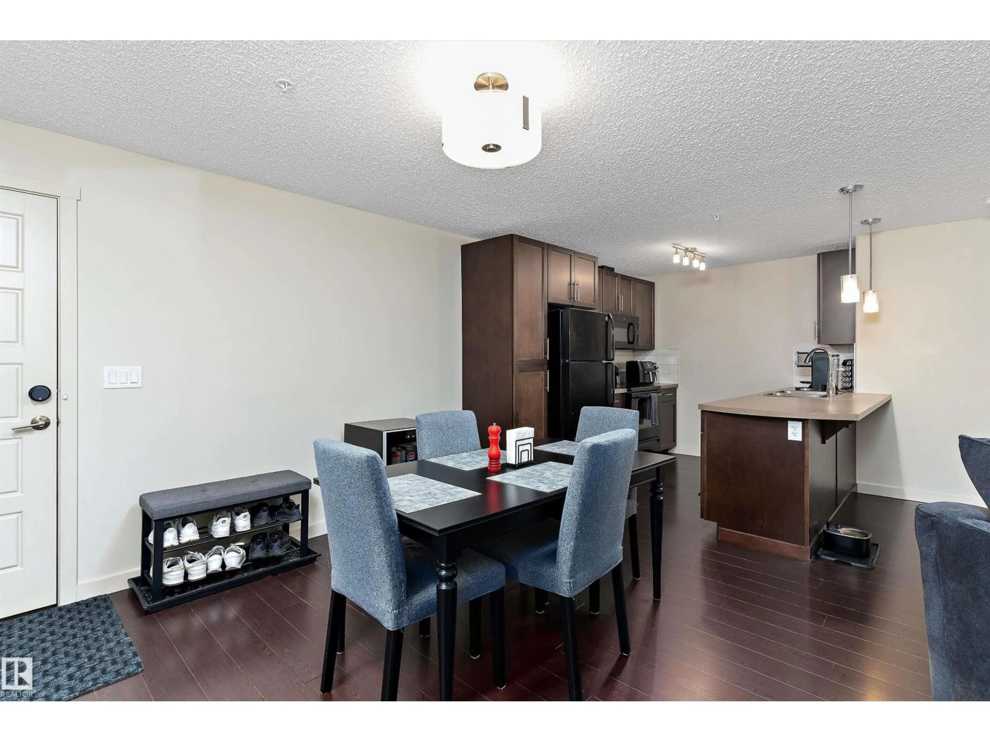 Dining room, wood/laminate floor for 6076 - 238 SCHONSEE WY, Edmonton Alberta T5Z0K8