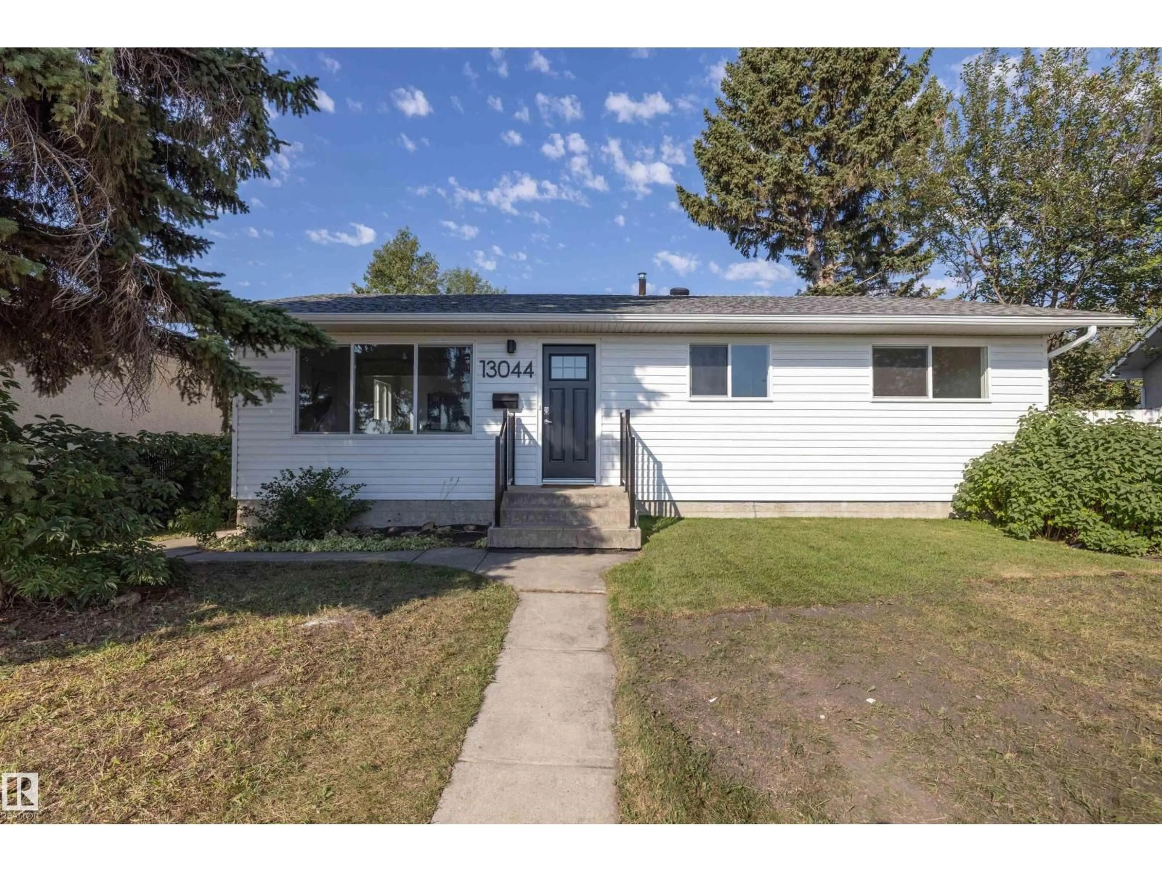 Home with vinyl exterior material, street for NW - 13044 78 ST, Edmonton Alberta T5C2A1