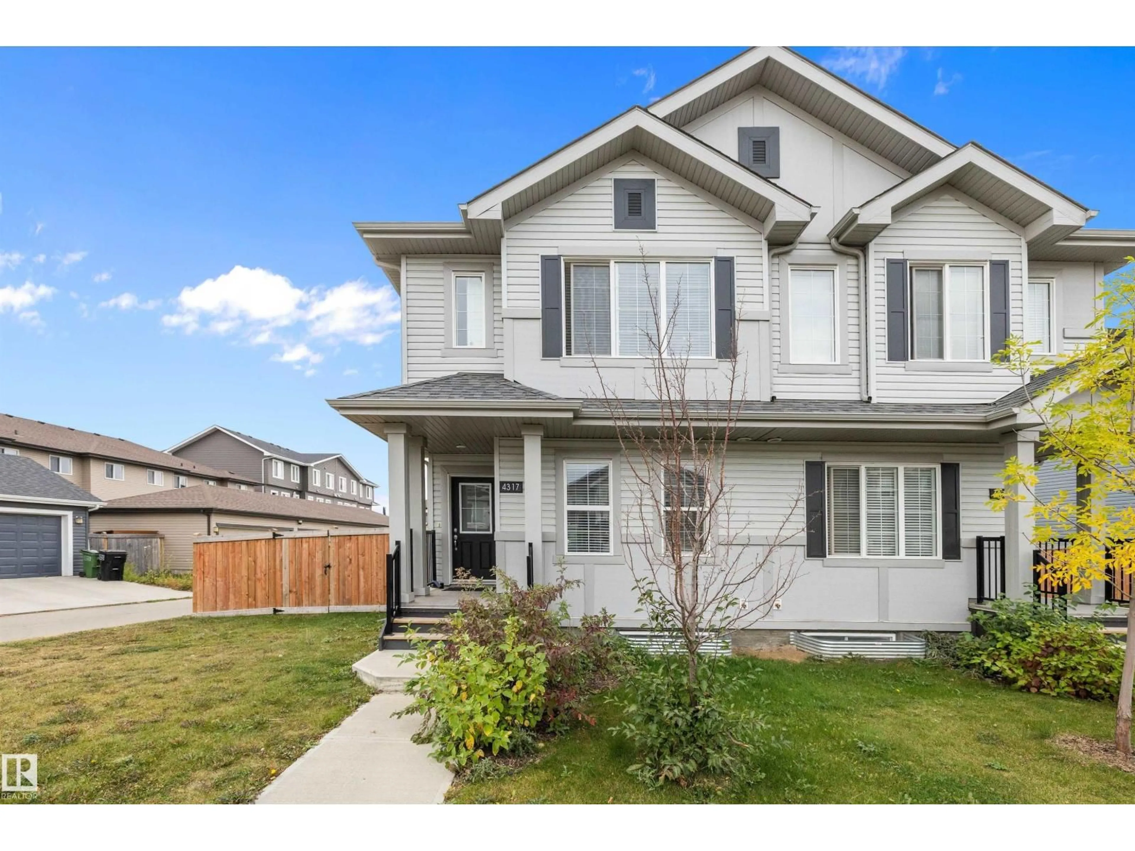 Home with vinyl exterior material, street for 4317 COOKE LN, Edmonton Alberta T6W4M7