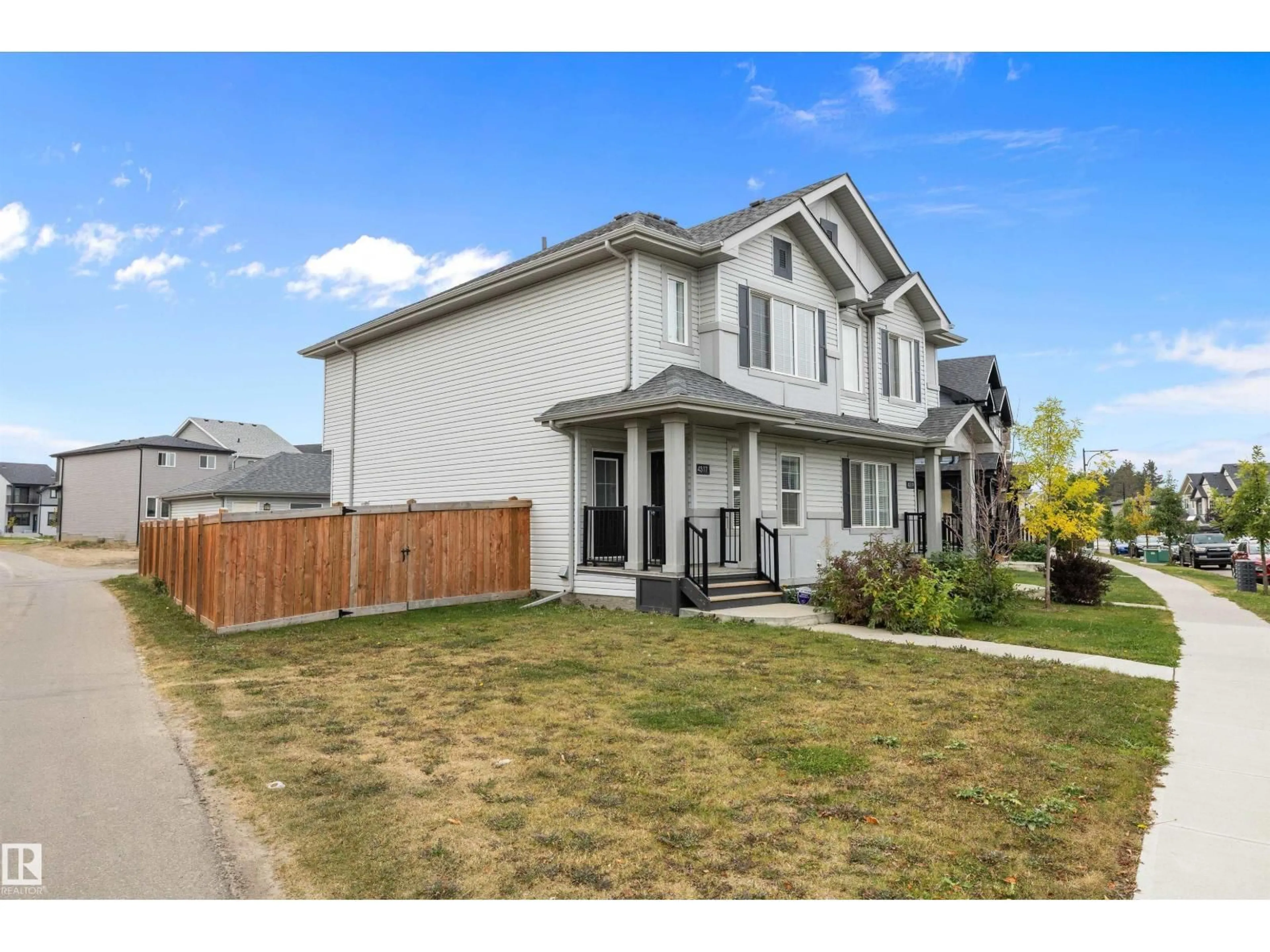 Home with vinyl exterior material, street for 4317 COOKE LN, Edmonton Alberta T6W4M7