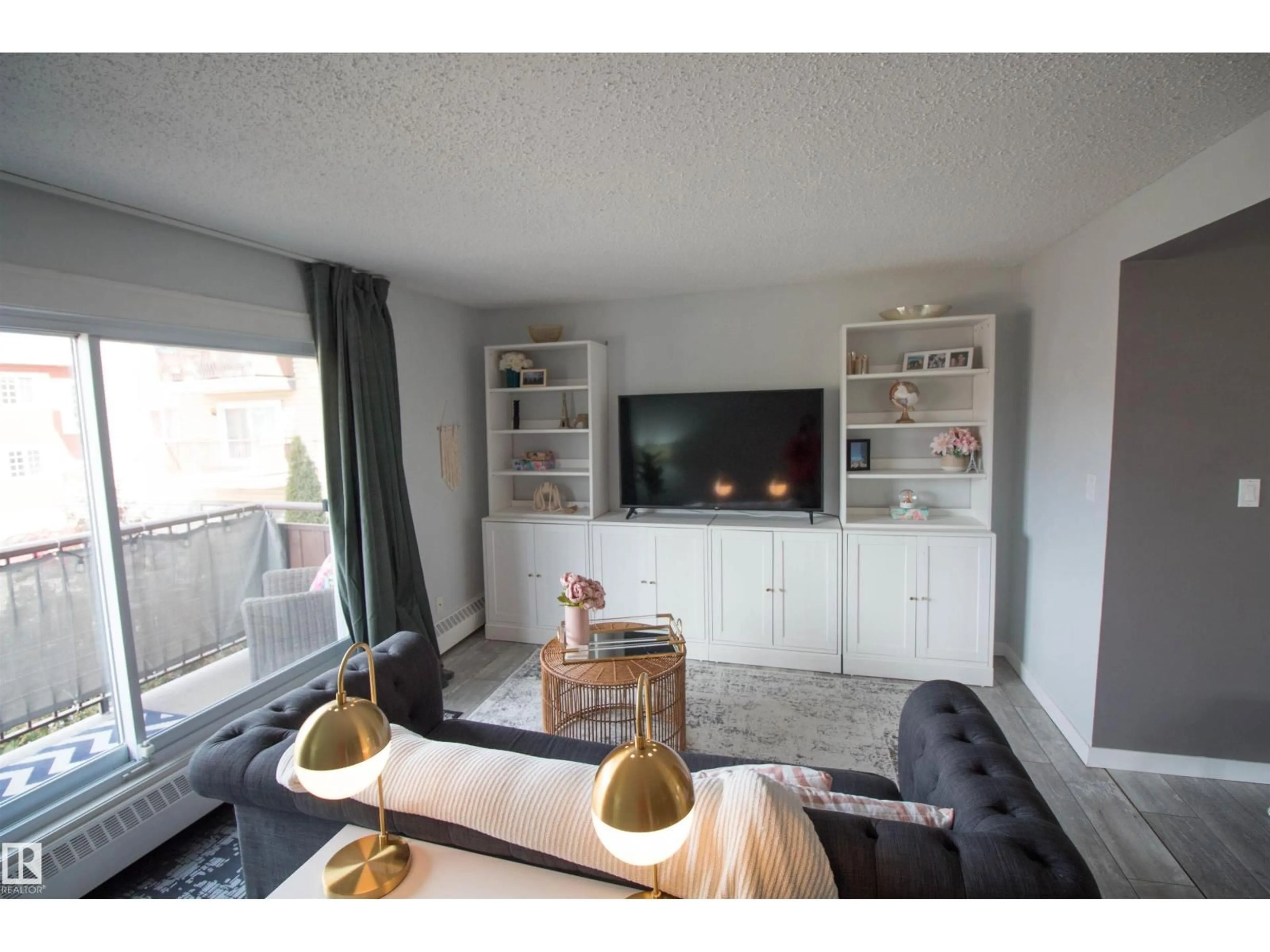 Living room with furniture, wood/laminate floor for #38 - 10208 113 ST, Edmonton Alberta T5K1P4