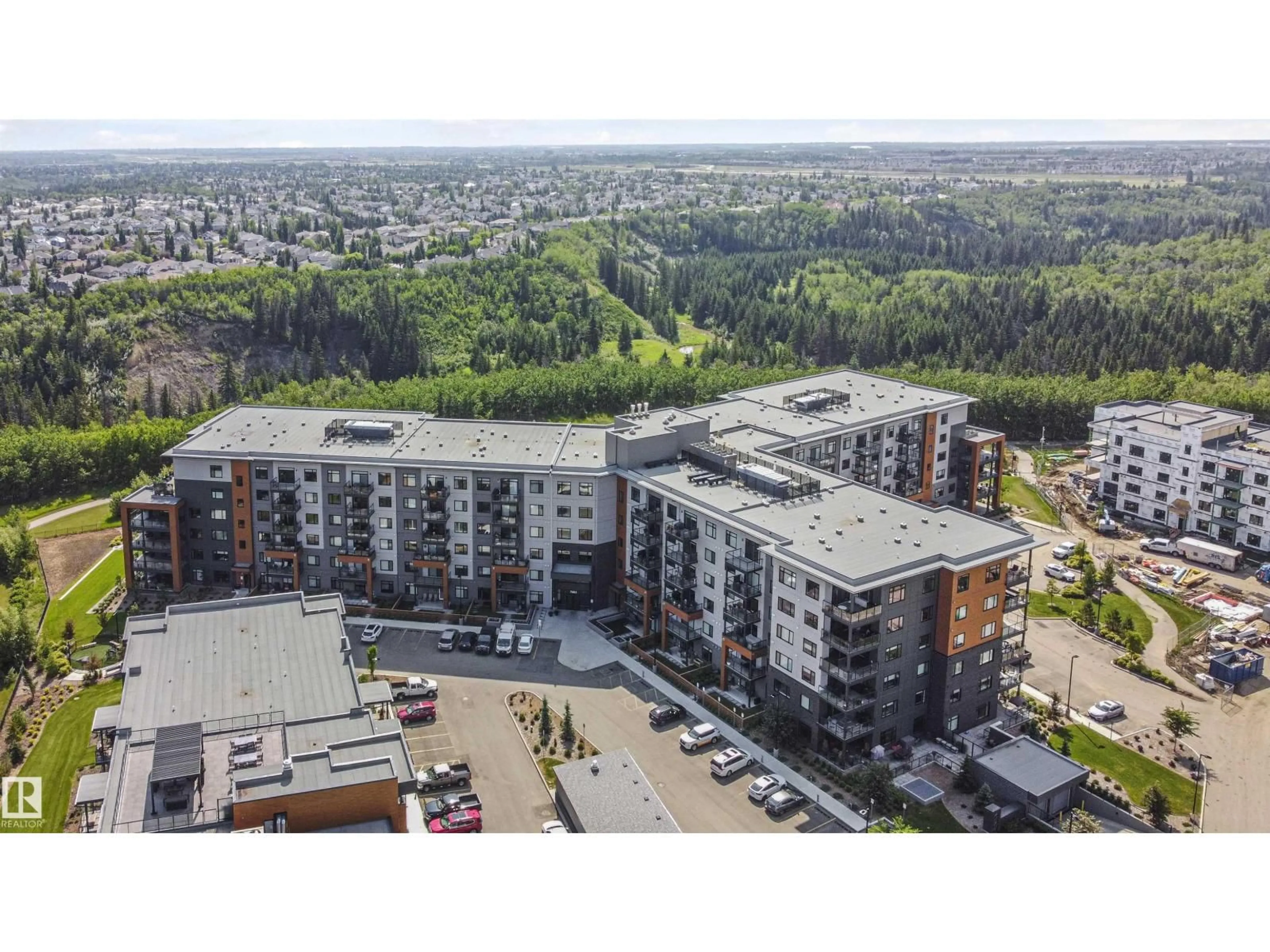 A pic from outside/outdoor area/front of a property/back of a property/a pic from drone, unknown for 619 7463 MAY CM NW, Edmonton Alberta T6R0X1