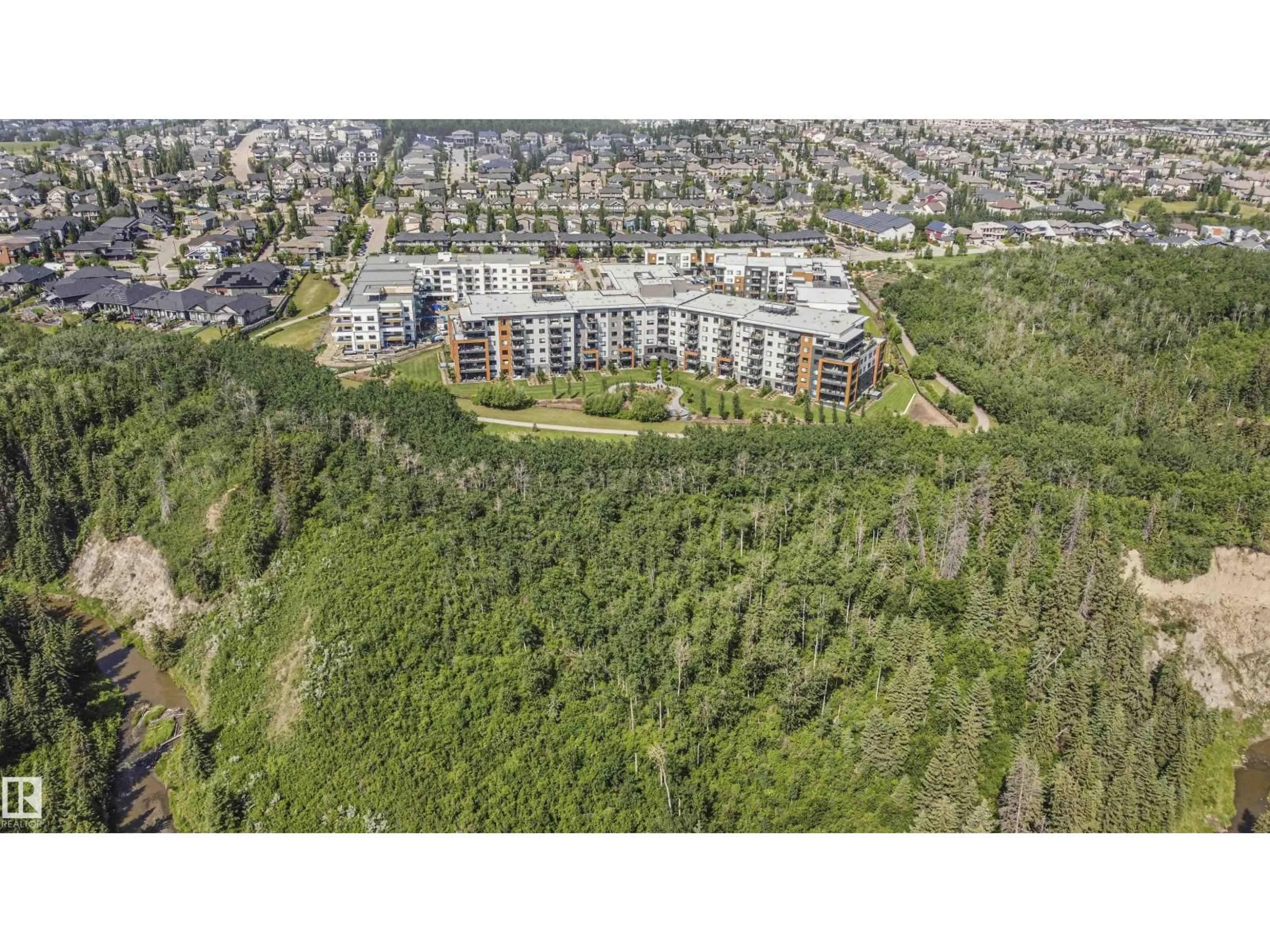 A pic from outside/outdoor area/front of a property/back of a property/a pic from drone, unknown for 619 7463 MAY CM NW, Edmonton Alberta T6R0X1