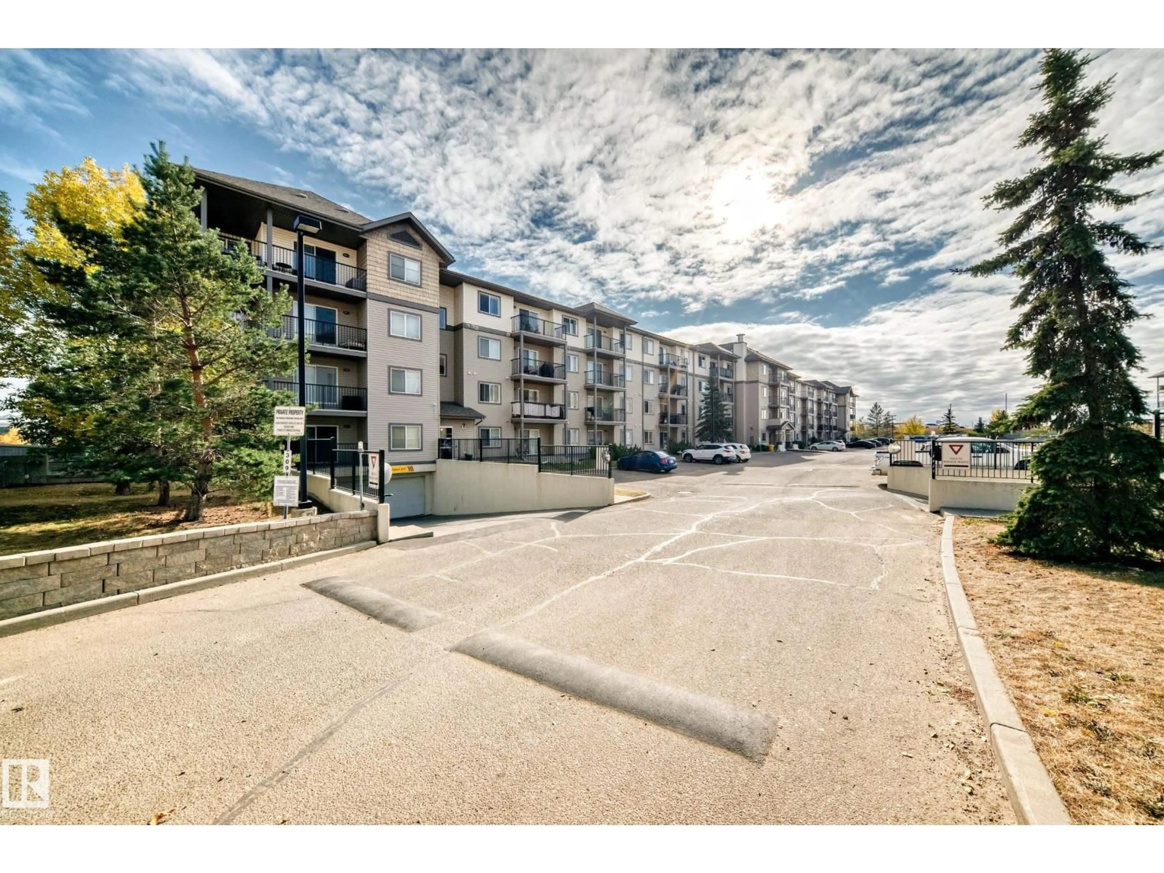 A pic from outside/outdoor area/front of a property/back of a property/a pic from drone, water/lake/river/ocean view for 309 - 118 CLAREVIEW STATION DR, Edmonton Alberta T5Y0C5