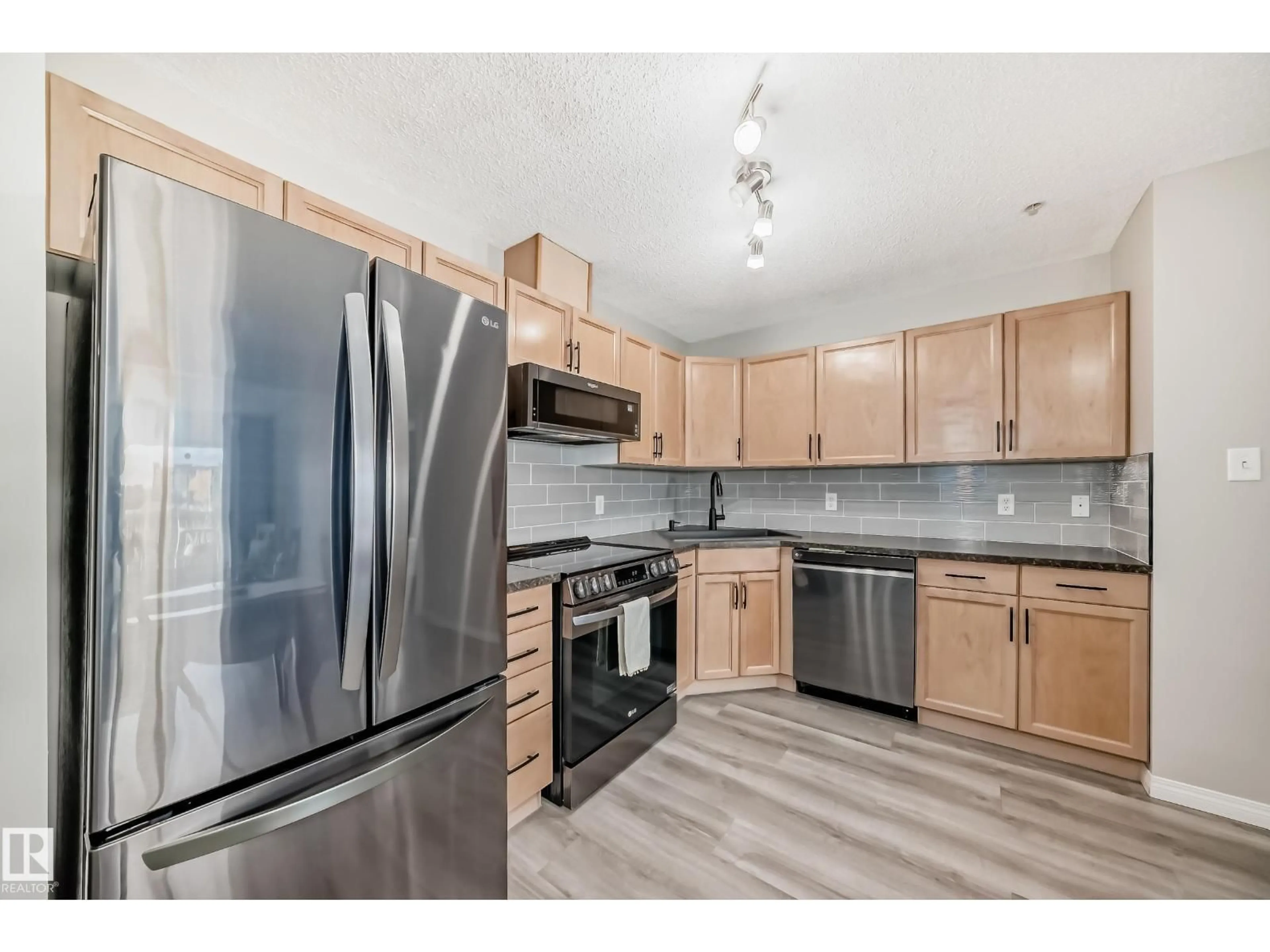 Standard kitchen, wood/laminate floor for 309 - 118 CLAREVIEW STATION DR, Edmonton Alberta T5Y0C5