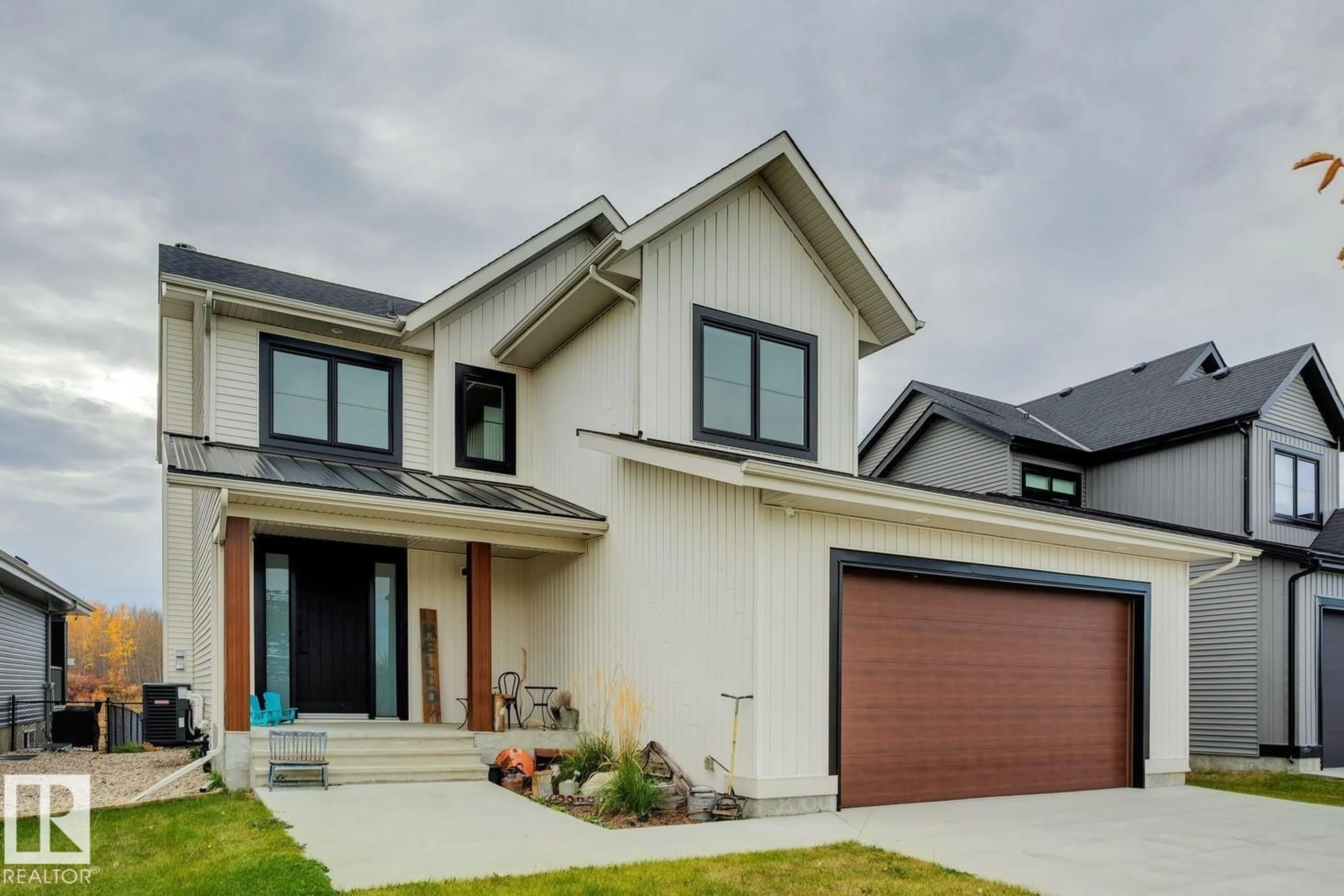 Home with brick exterior material, street for #26 - 3410 STE. ANNE TR, Rural Lac Ste. Anne County Alberta T0E0A1