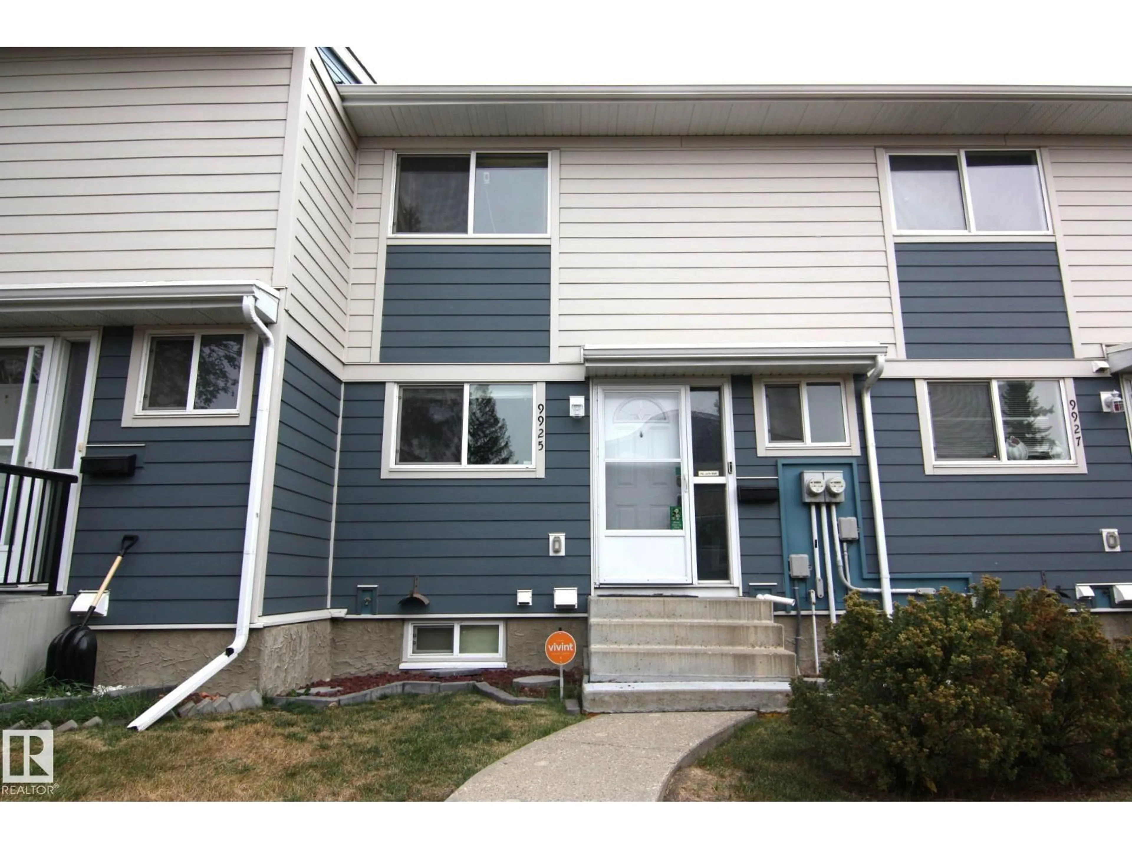 Home with vinyl exterior material, street for 9925 171 AV, Edmonton Alberta T5X4X2
