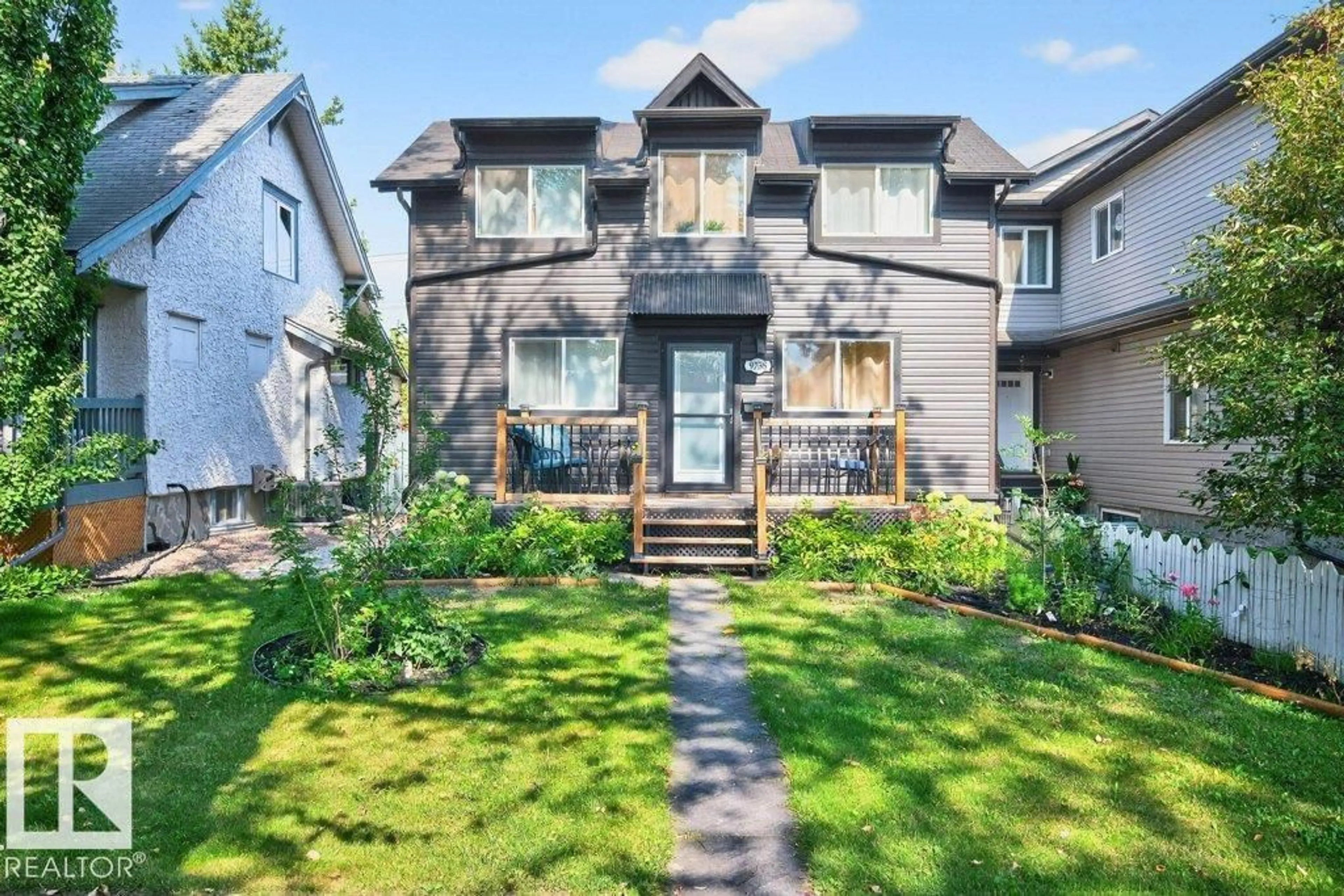 Home with brick exterior material, street for NW - 9738 81 AV, Edmonton Alberta T6E1W2