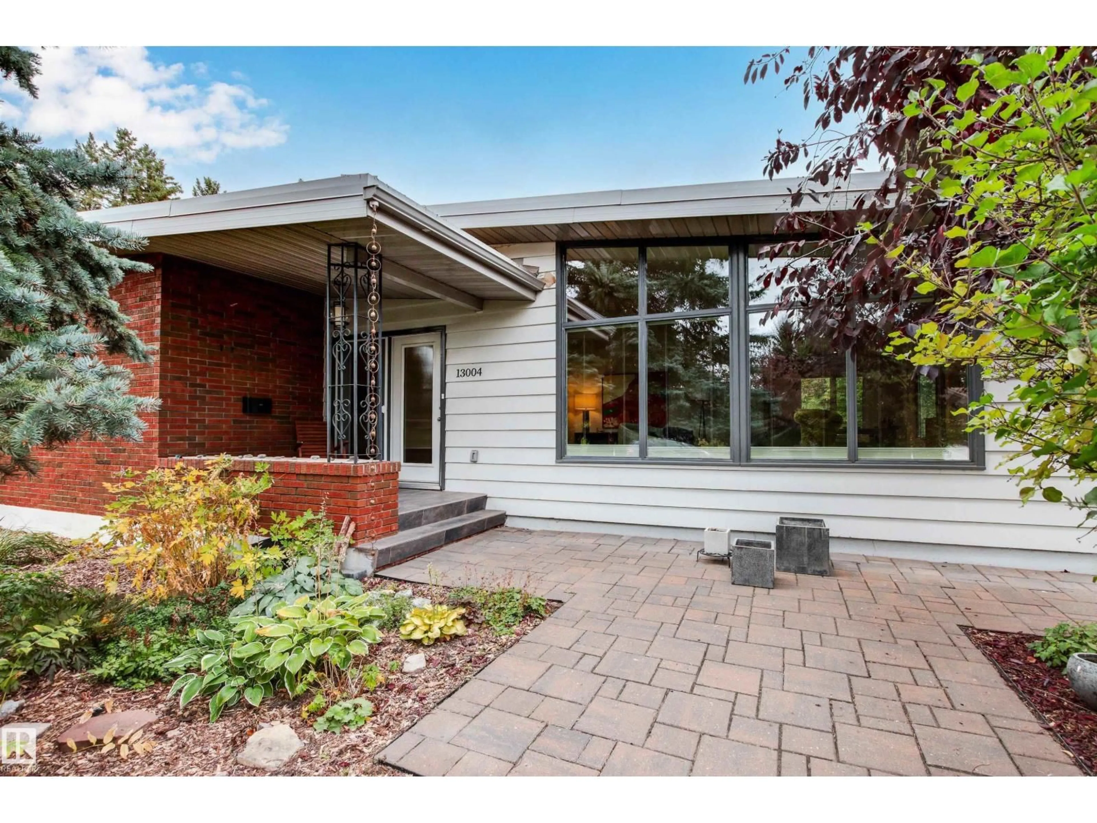 Home with brick exterior material, street for NW - 13004 63 AV, Edmonton Alberta T6H1S1