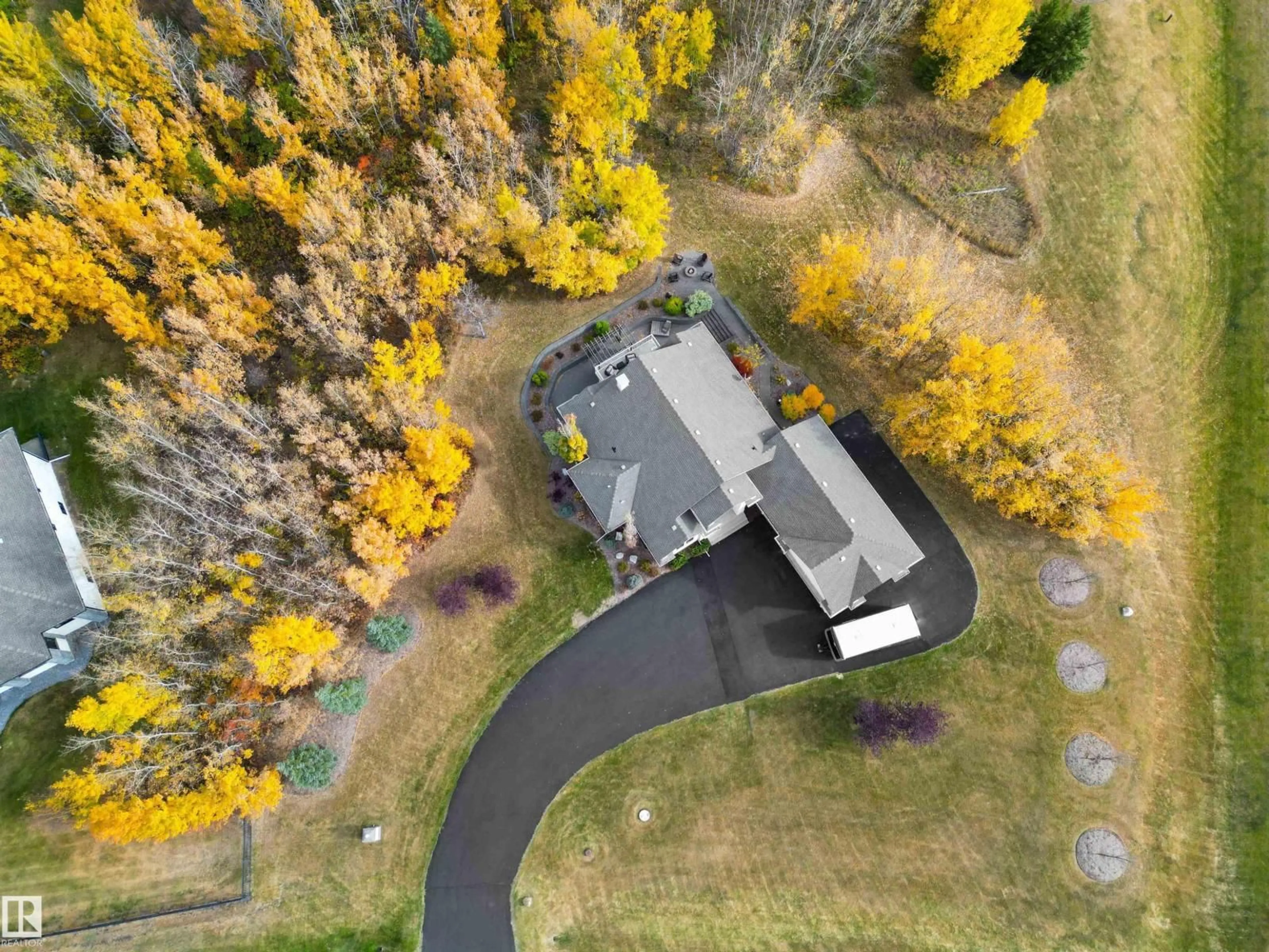 A pic from outside/outdoor area/front of a property/back of a property/a pic from drone, forest/trees view for 52422 - 194 RGE ROAD 224, Rural Strathcona County Alberta T8A6N1
