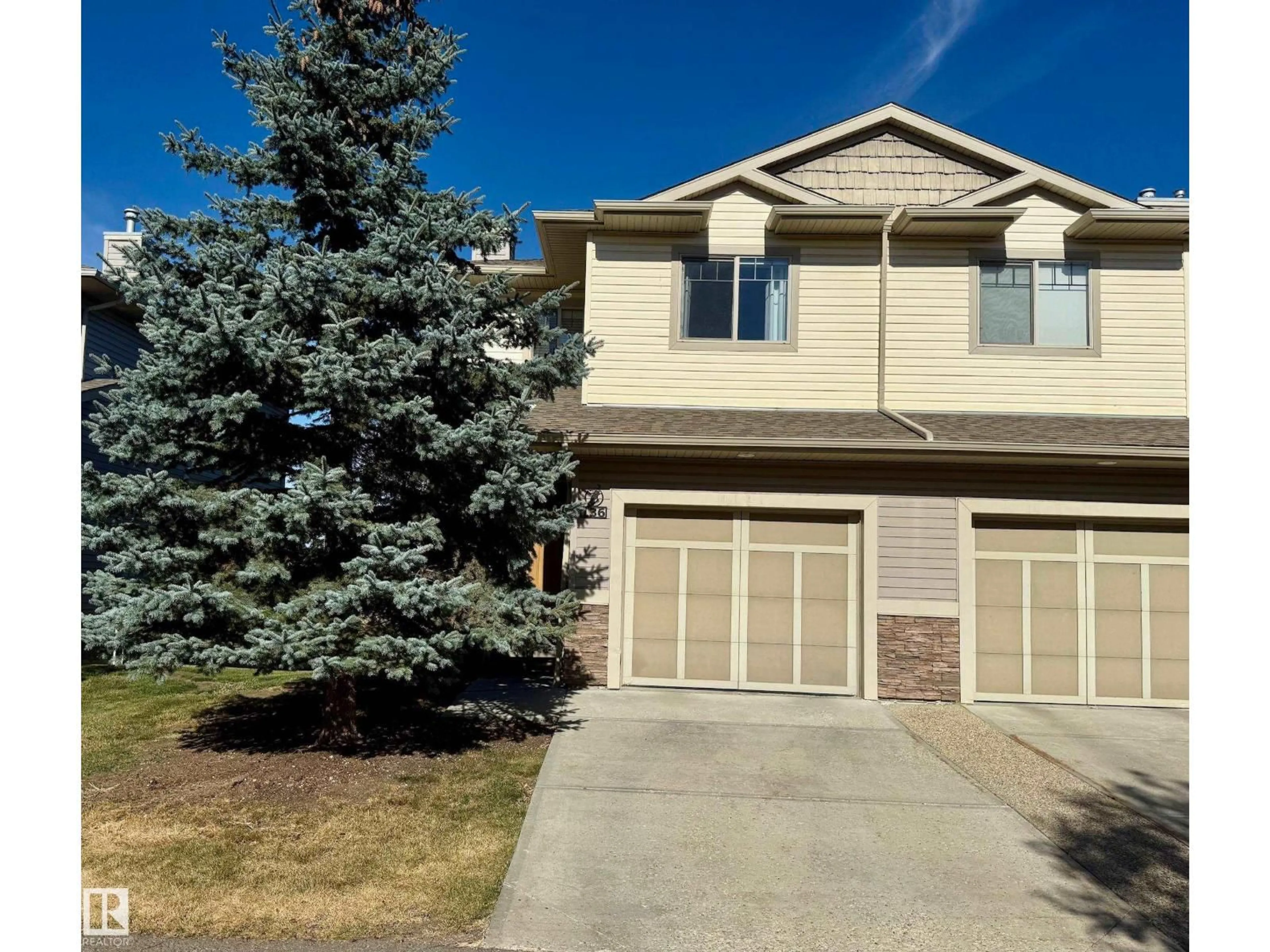 Home with vinyl exterior material, street for 5420 - 136 GRANT MACEWAN BV, Leduc Alberta T9E0M1