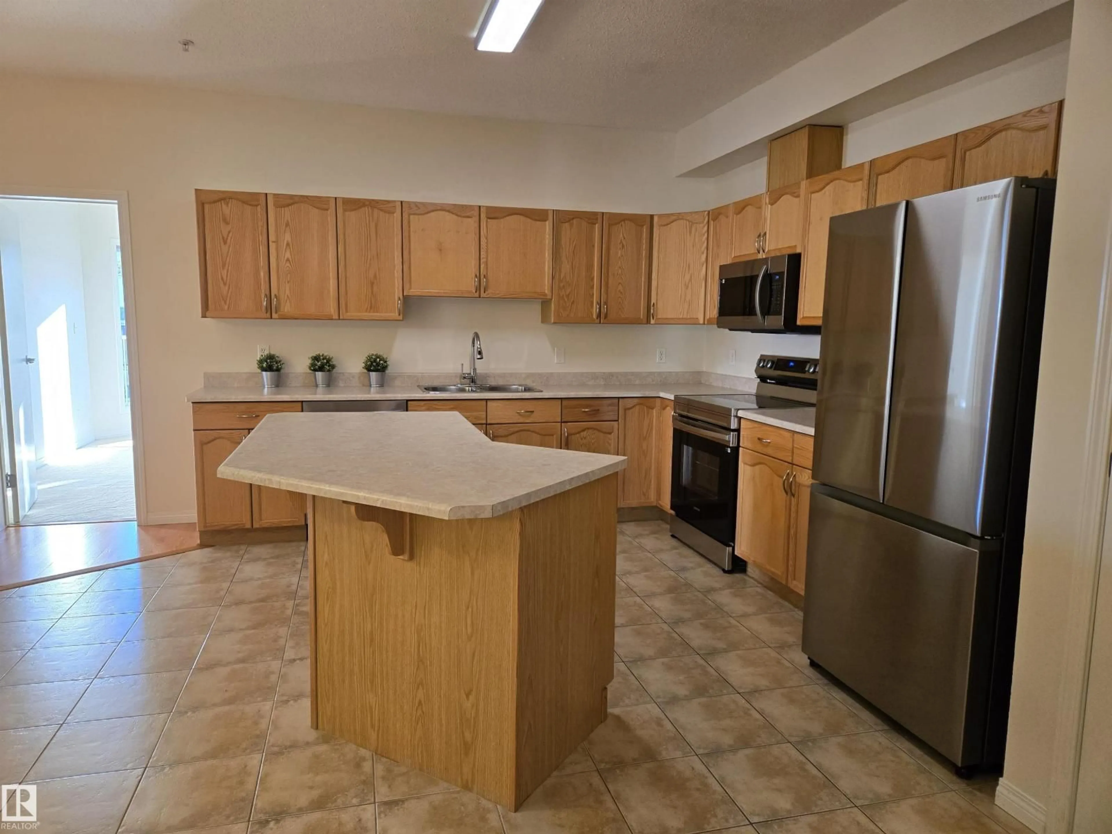 Standard kitchen, unknown for #322 - 4304 139 AV, Edmonton Alberta T5Y0H6