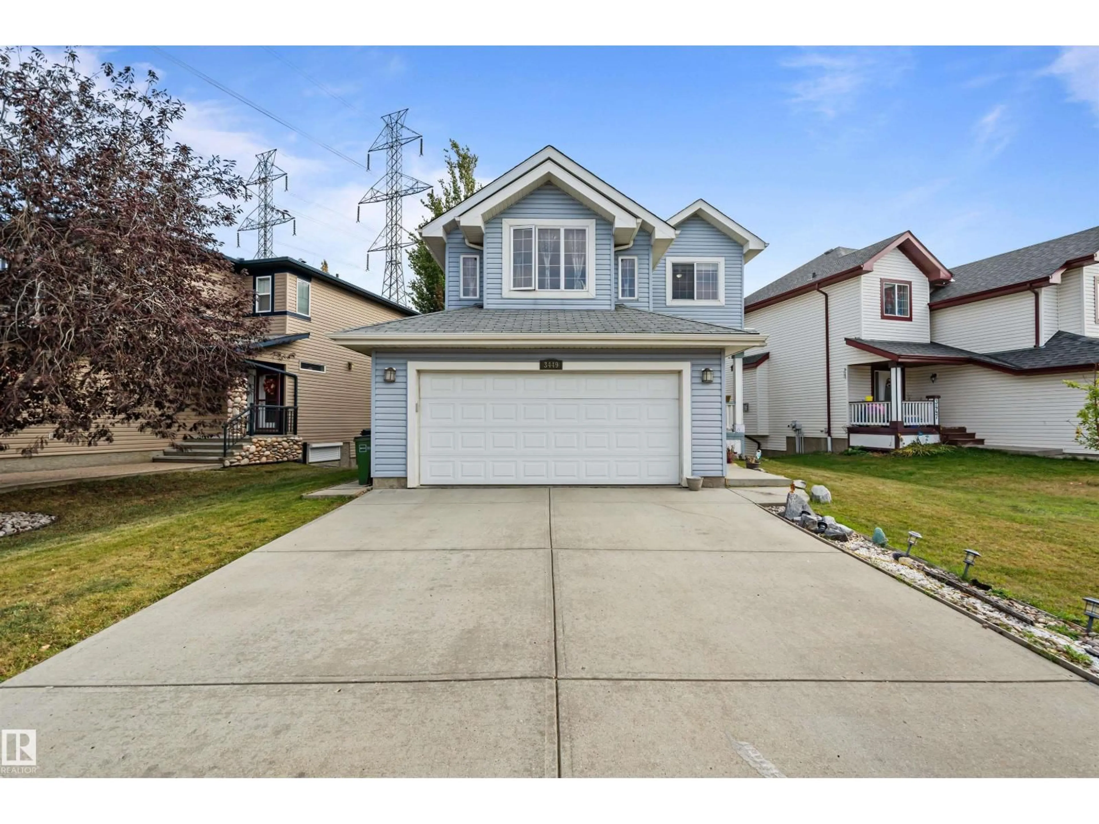 Home with vinyl exterior material, street for NW - 3449 28 ST, Edmonton Alberta T6T2A5