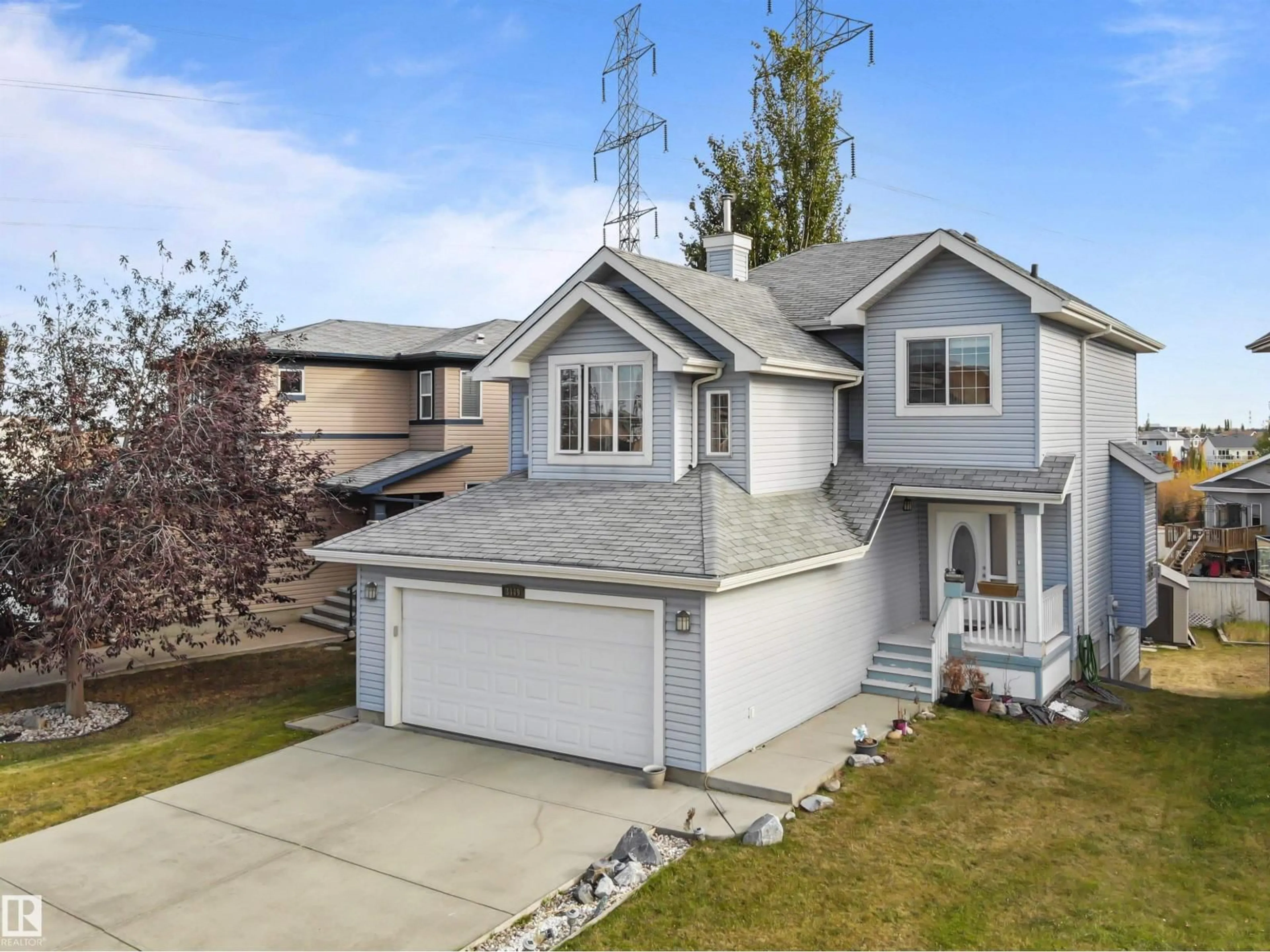 Home with vinyl exterior material, street for NW - 3449 28 ST, Edmonton Alberta T6T2A5