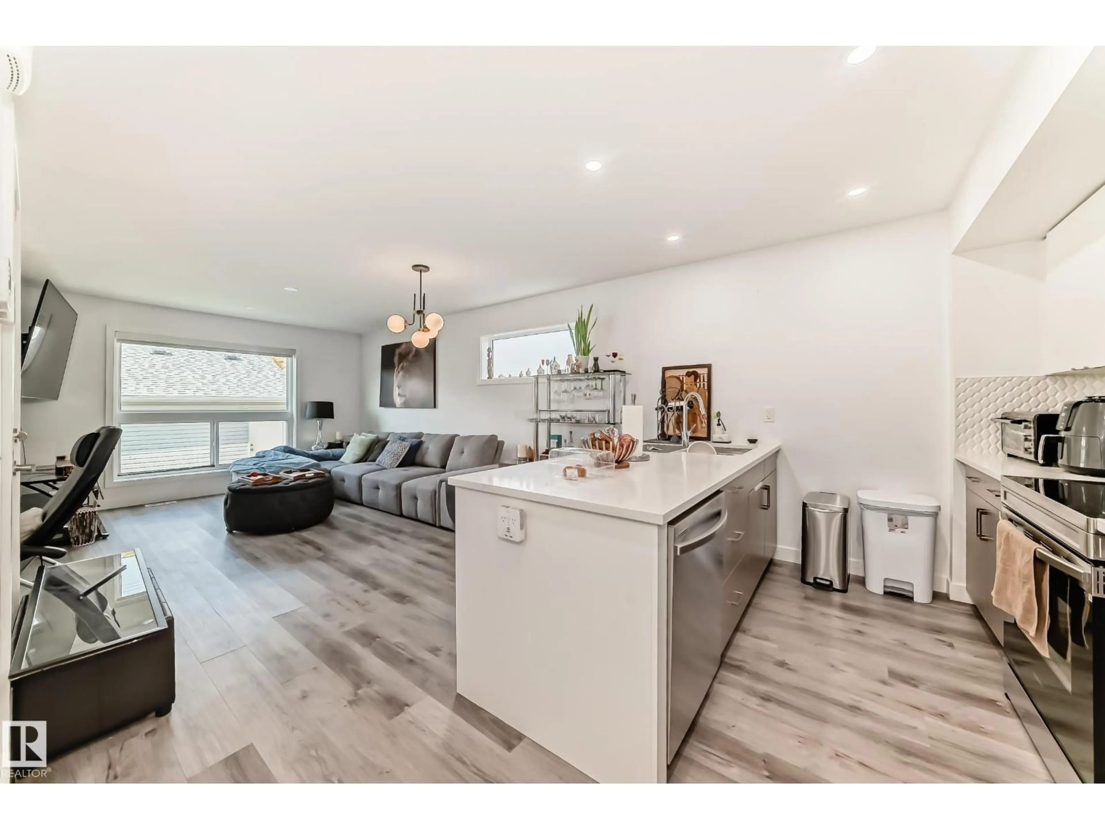 Open concept kitchen, wood/laminate floor for 11326 95A ST ST, Edmonton Alberta T5G1P1