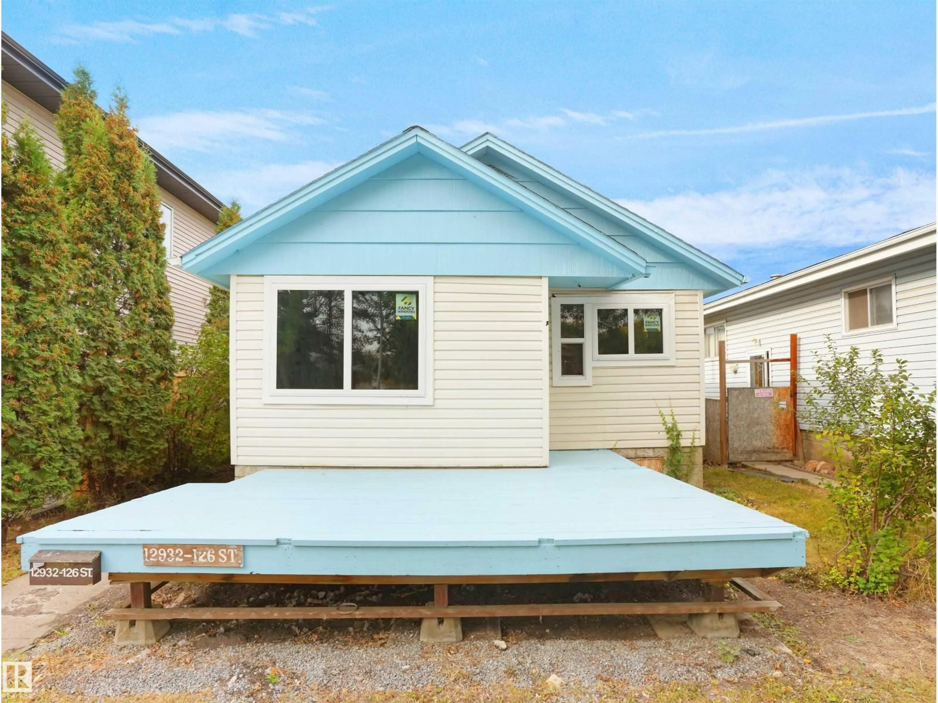Home with vinyl exterior material, street for NW - 12932 126 ST, Edmonton Alberta T5L0Y3