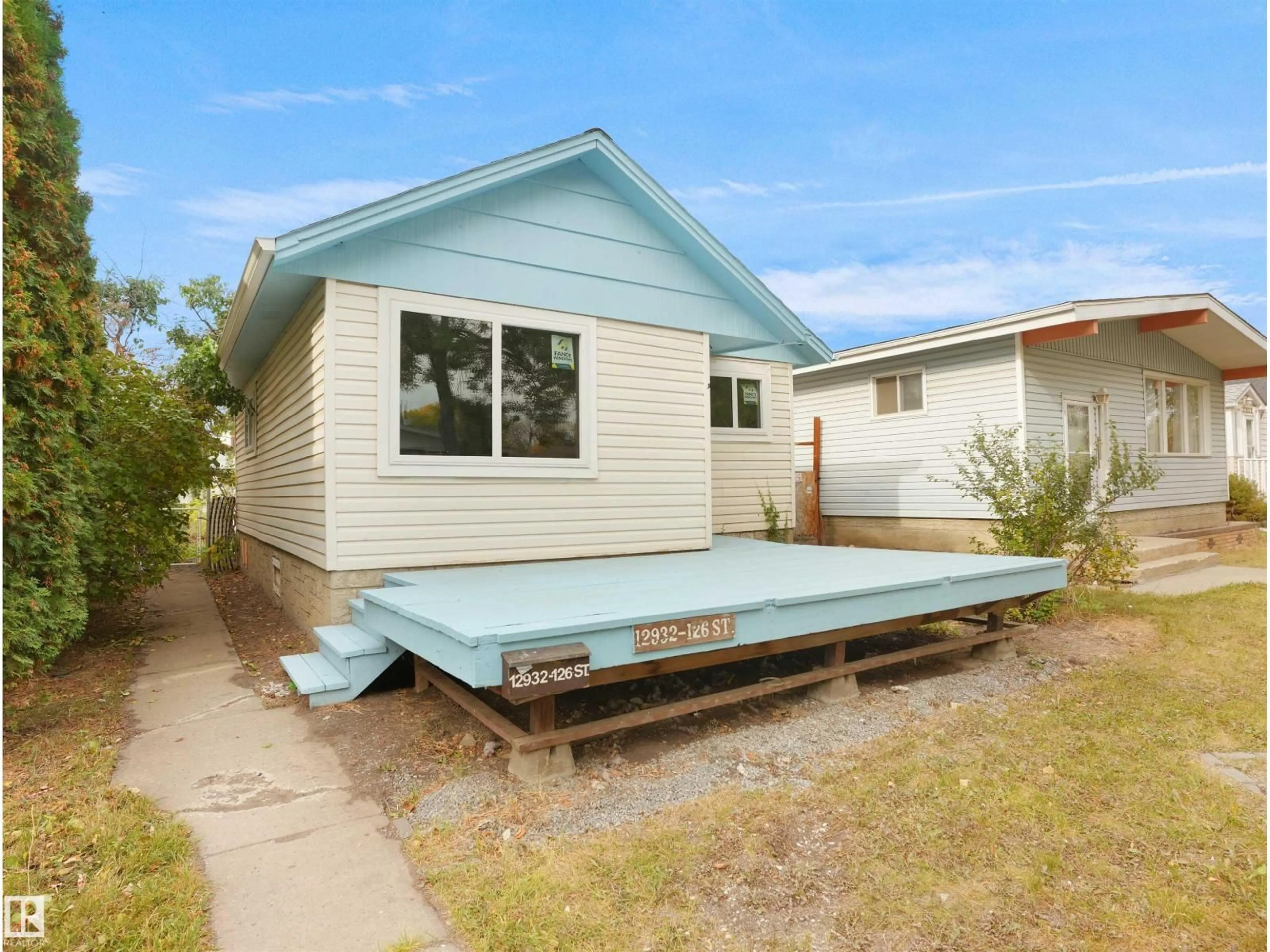 Home with vinyl exterior material, street for NW - 12932 126 ST, Edmonton Alberta T5L0Y3