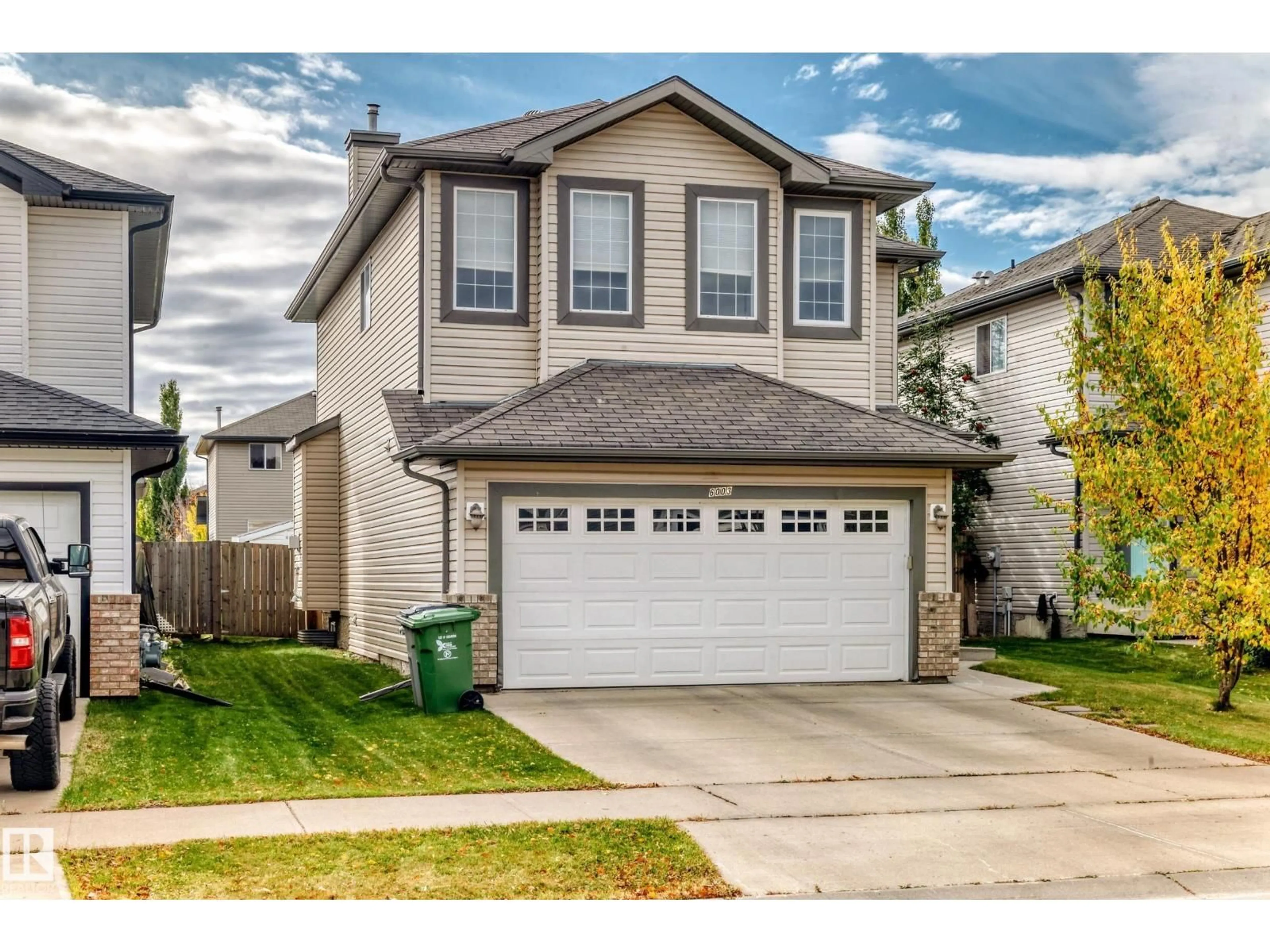 Home with vinyl exterior material, street for 6003 48 AV, Beaumont Alberta T4X0A3