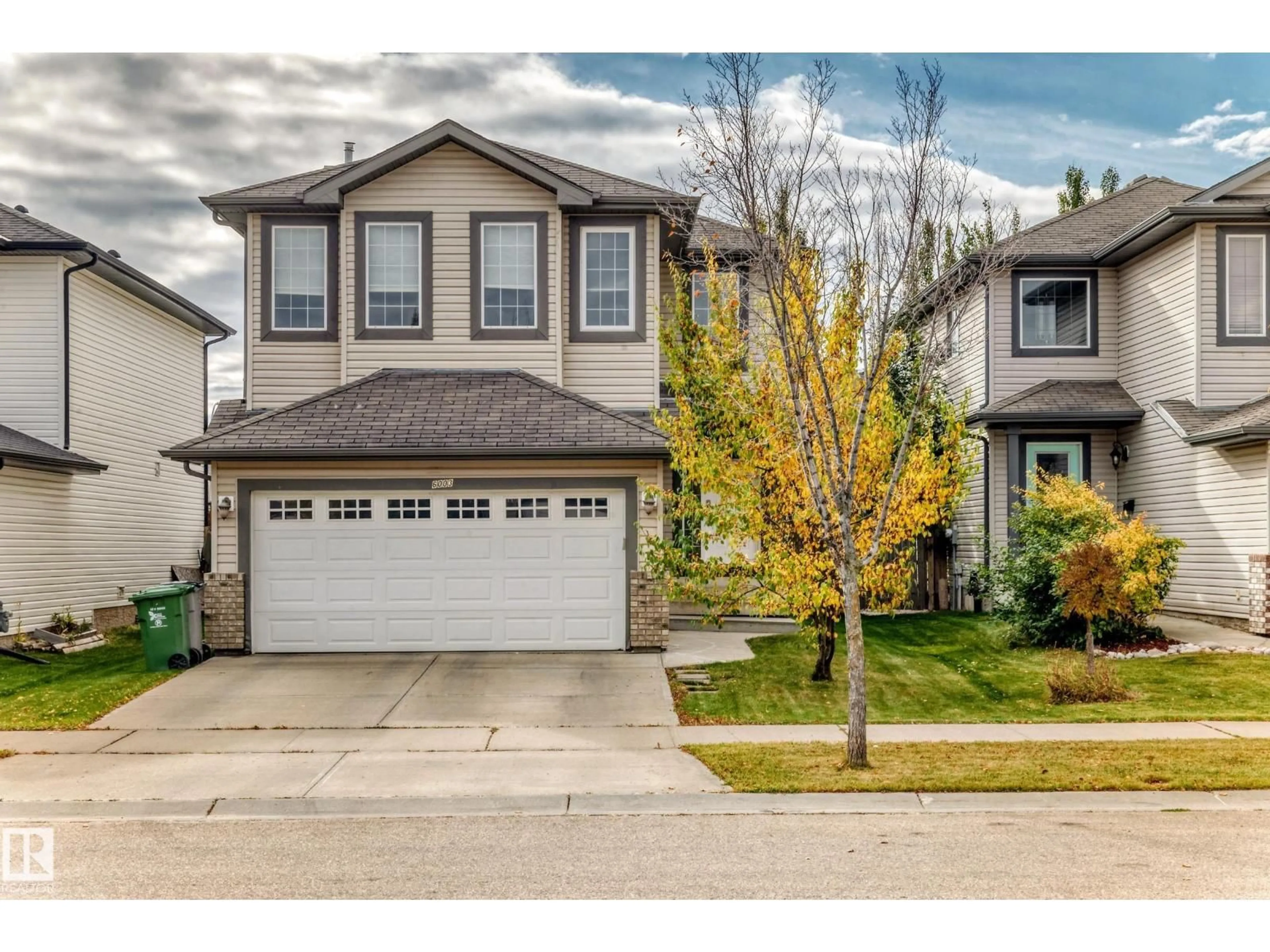 Home with vinyl exterior material, street for 6003 48 AV, Beaumont Alberta T4X0A3