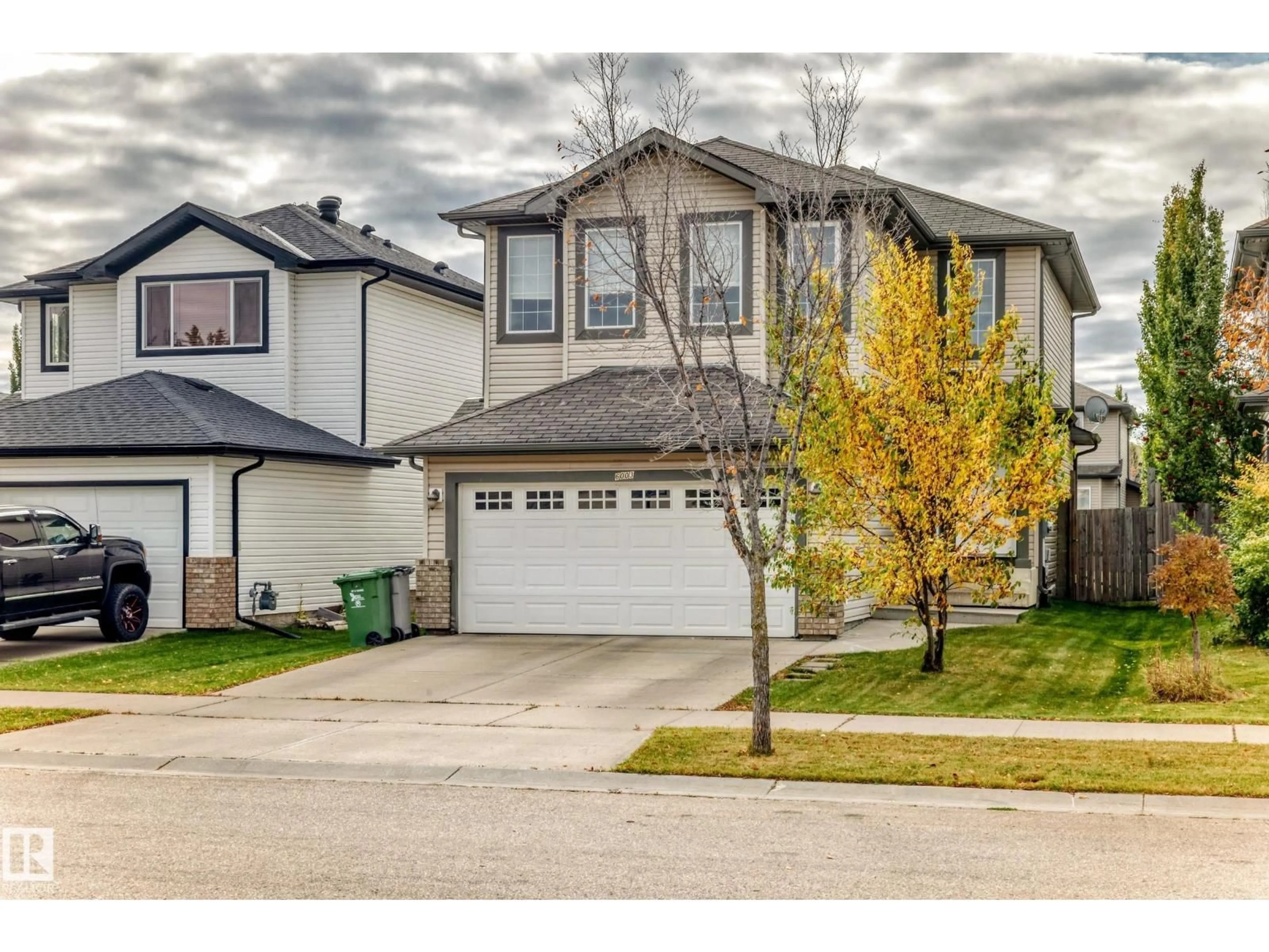 Home with vinyl exterior material, street for 6003 48 AV, Beaumont Alberta T4X0A3