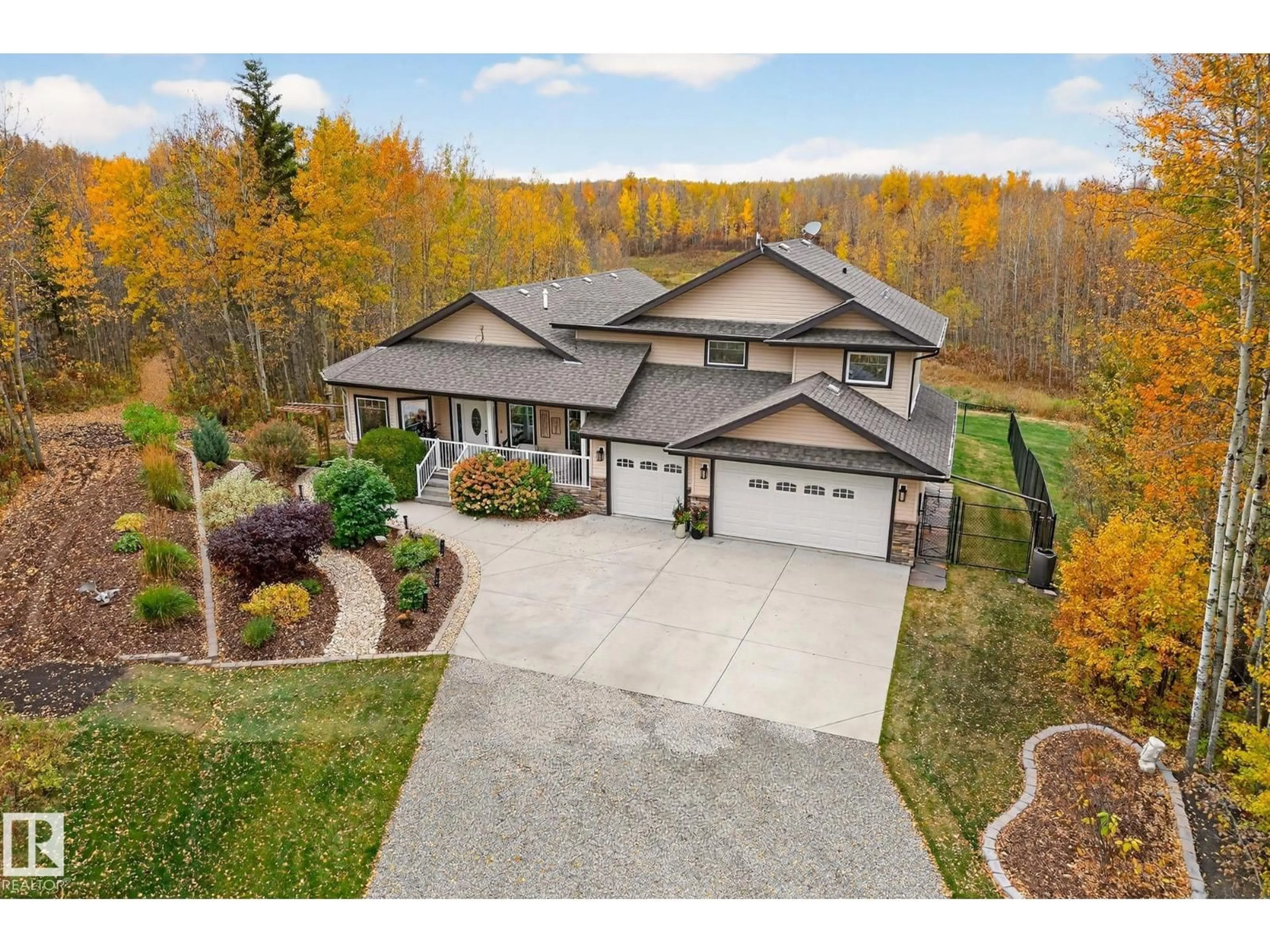 A pic from outside/outdoor area/front of a property/back of a property/a pic from drone, unknown for 20308 TWP ROAD 510, Rural Strathcona County Alberta T8G1E4