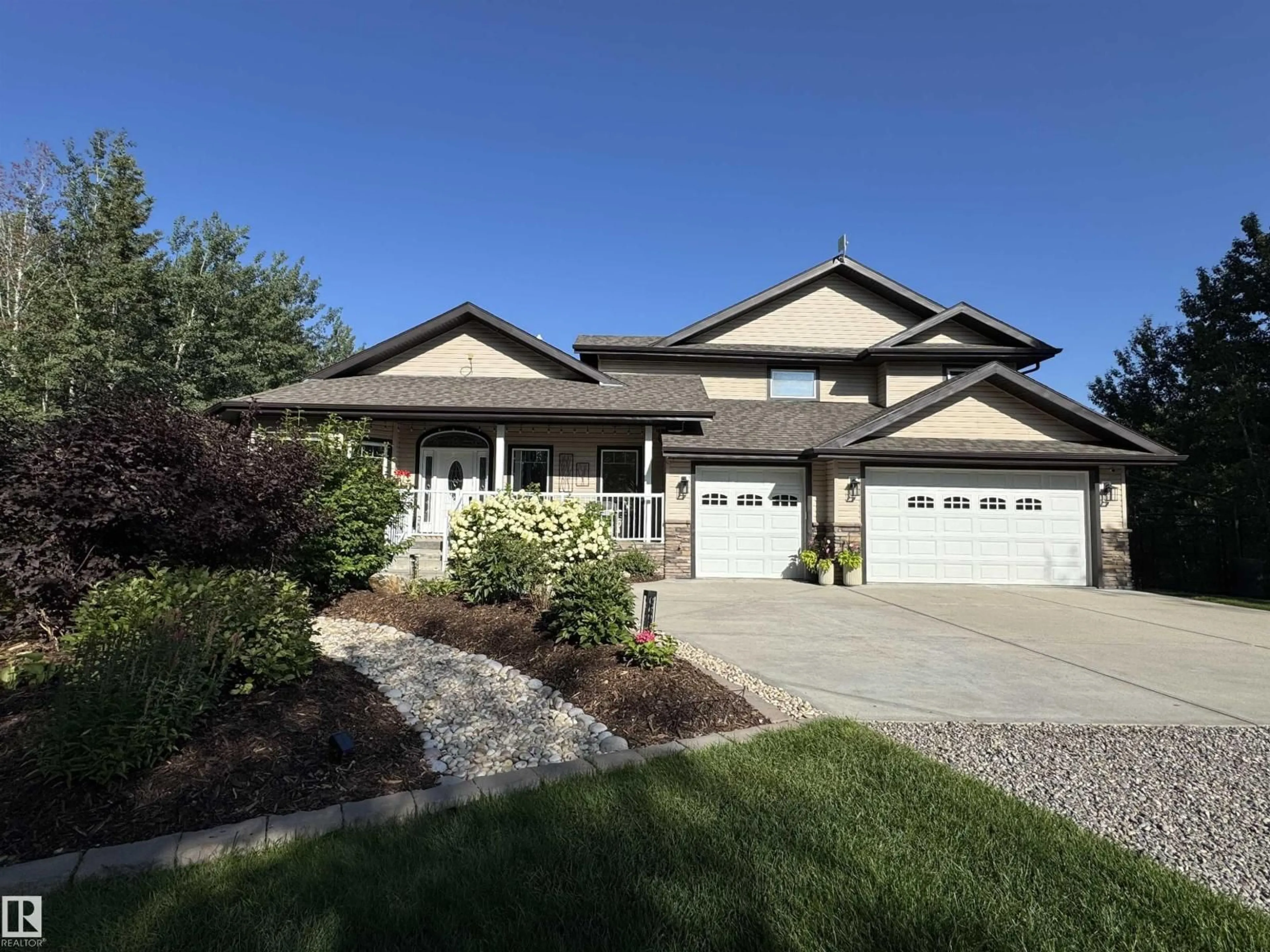 Home with vinyl exterior material, street for 20308 TWP ROAD 510, Rural Strathcona County Alberta T8G1E4