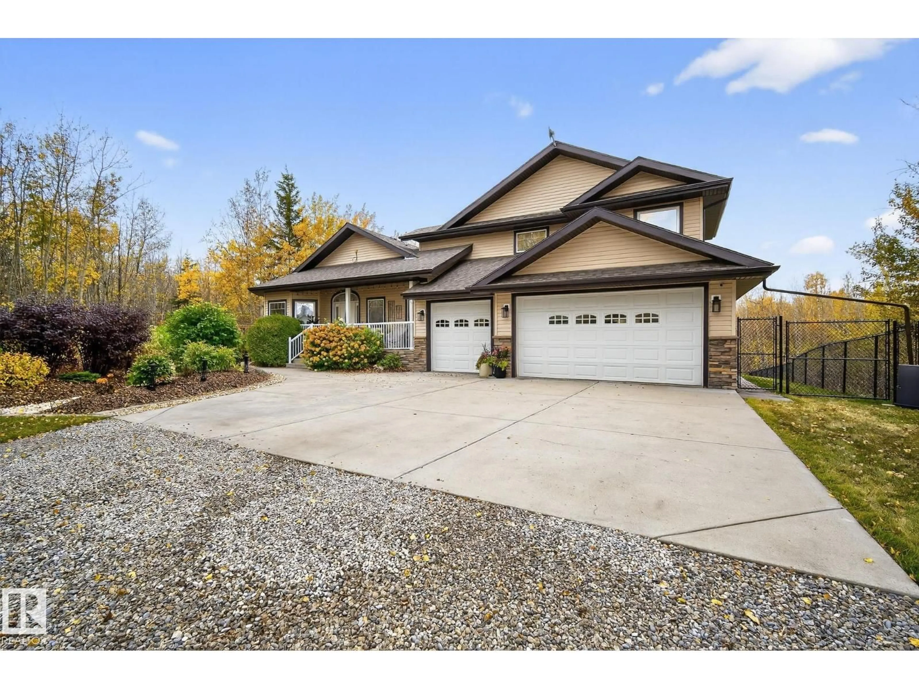 Home with vinyl exterior material, street for 20308 TWP ROAD 510, Rural Strathcona County Alberta T8G1E4