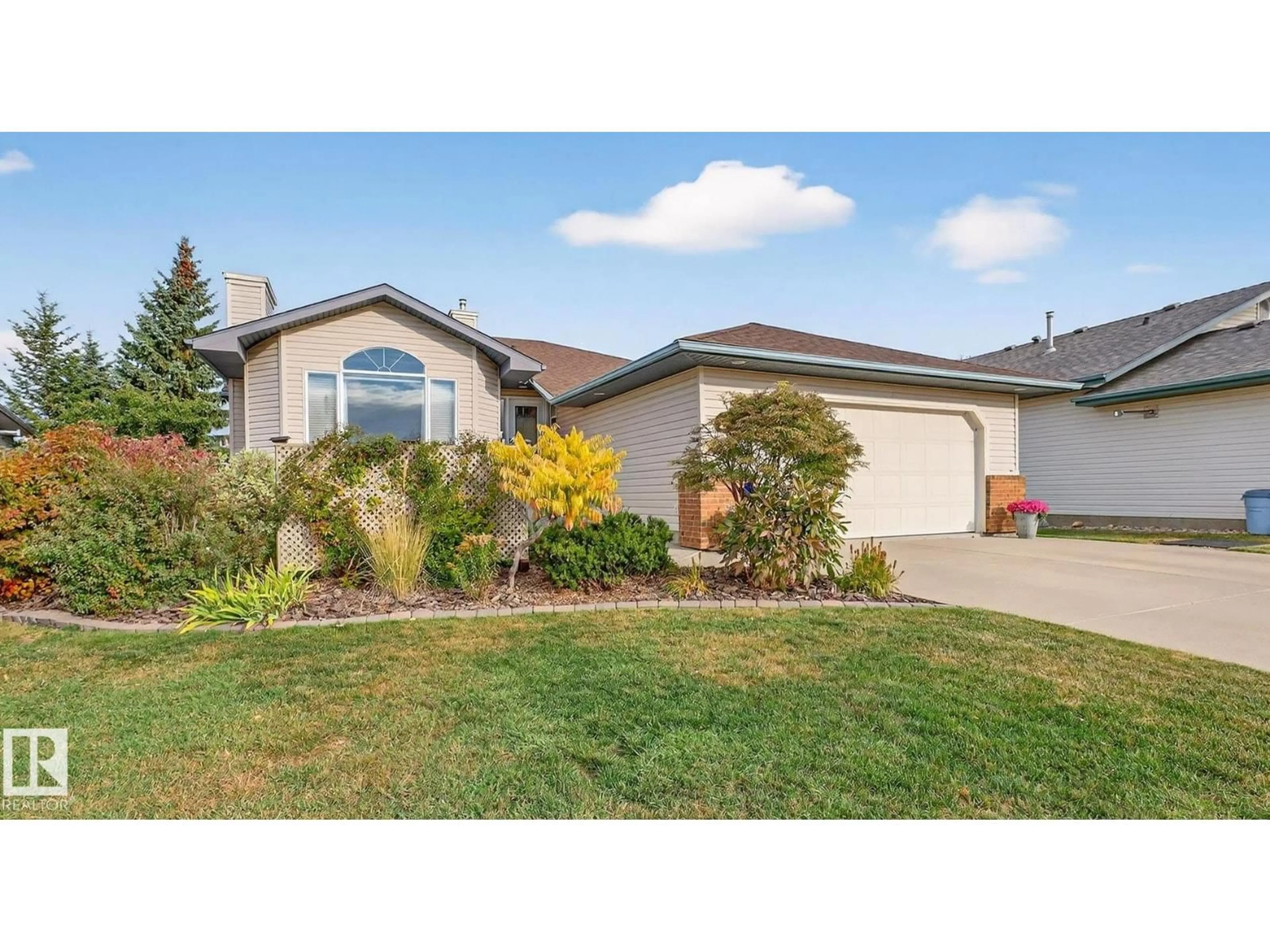 Home with vinyl exterior material, street for 104 CHANCERY, Sherwood Park Alberta T8H1Z4